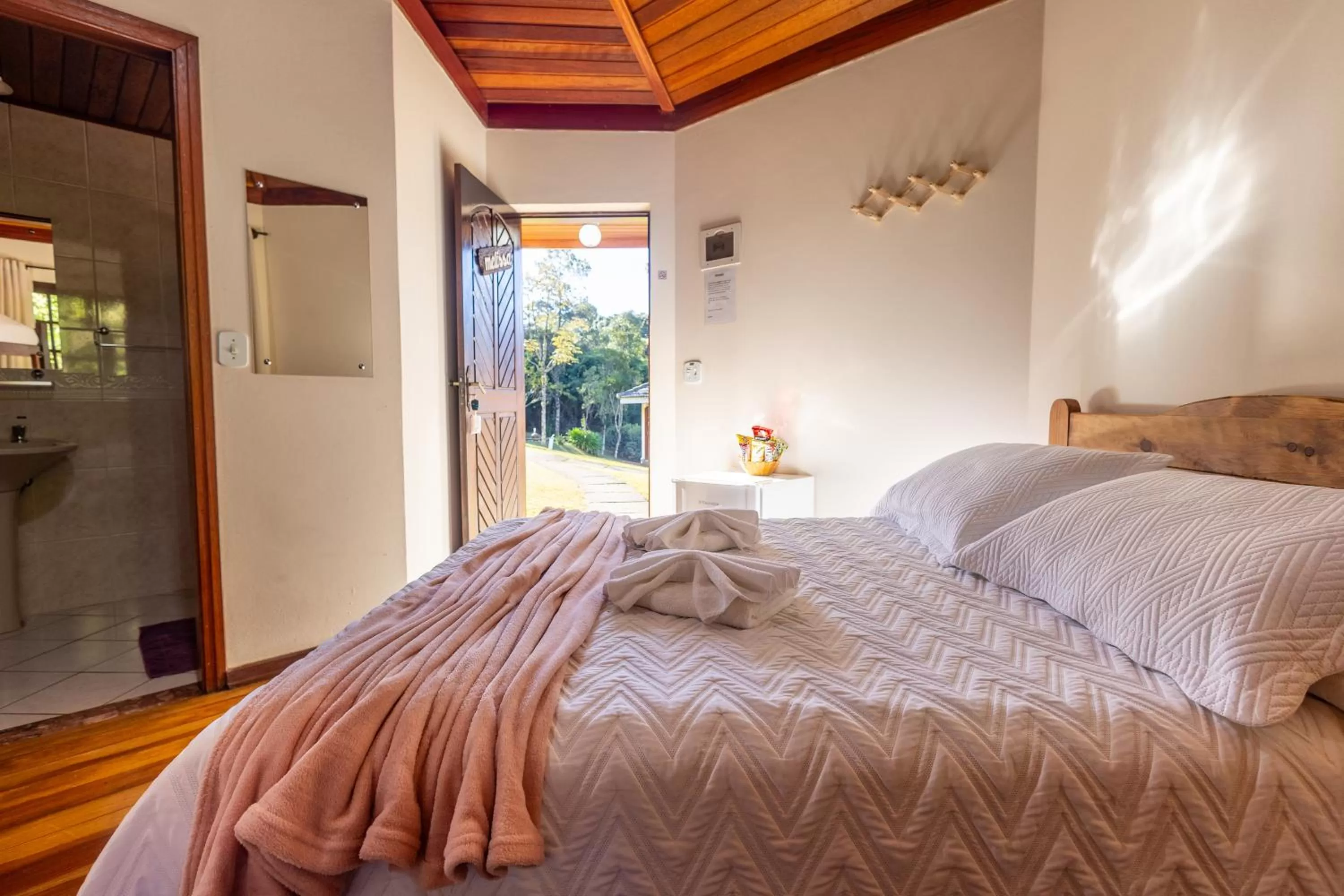 Bed in Chalés 3 Pinheiros