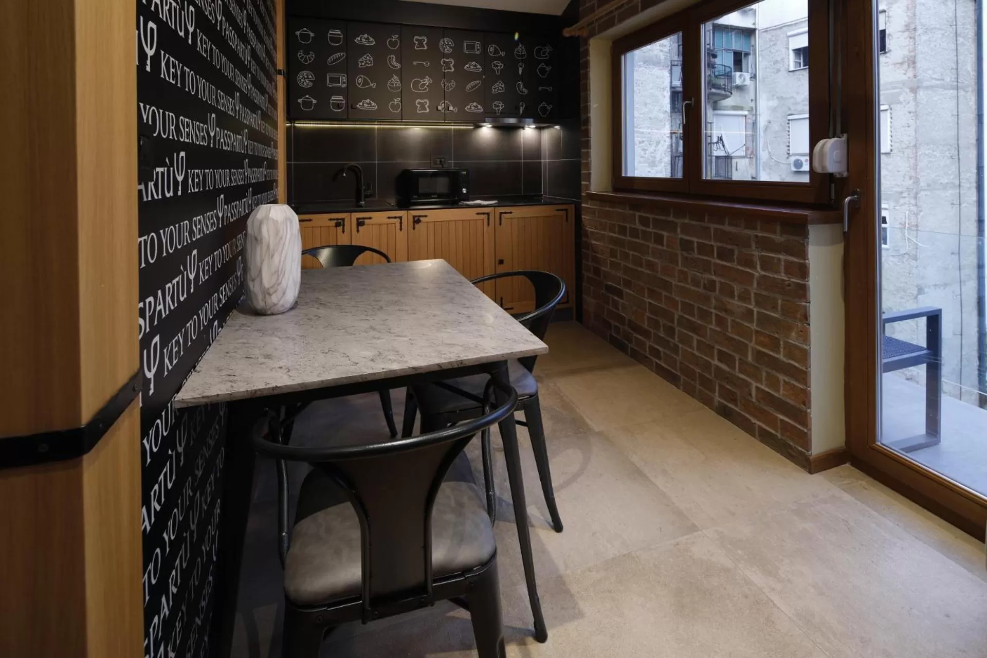 Dining area in Hotel Passpartù Home Garni