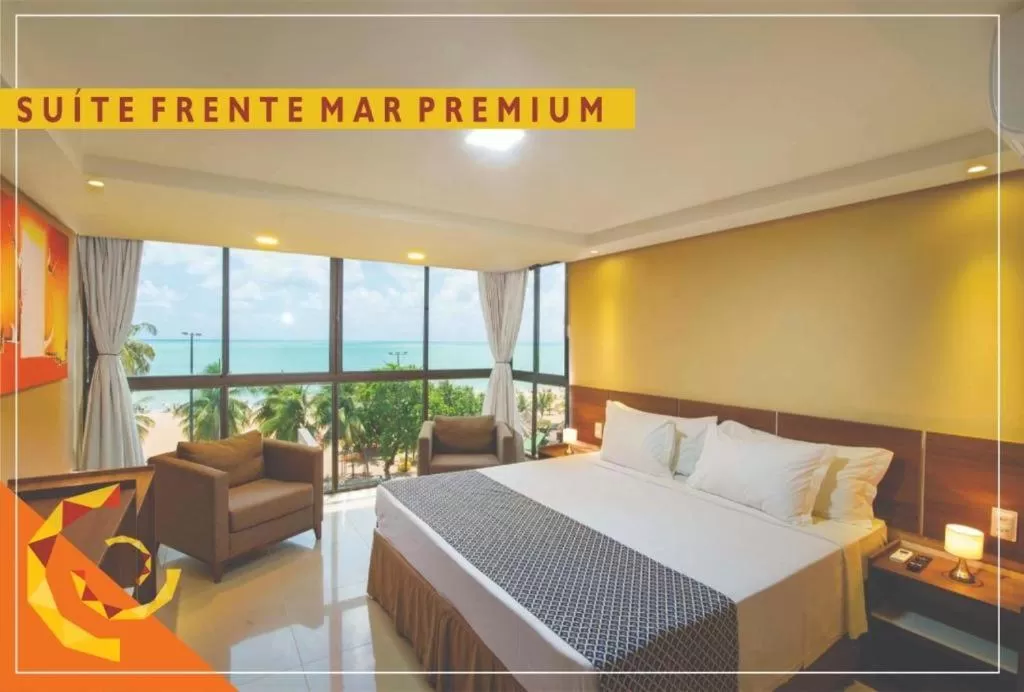 Bed in Netuanah Praia Hotel