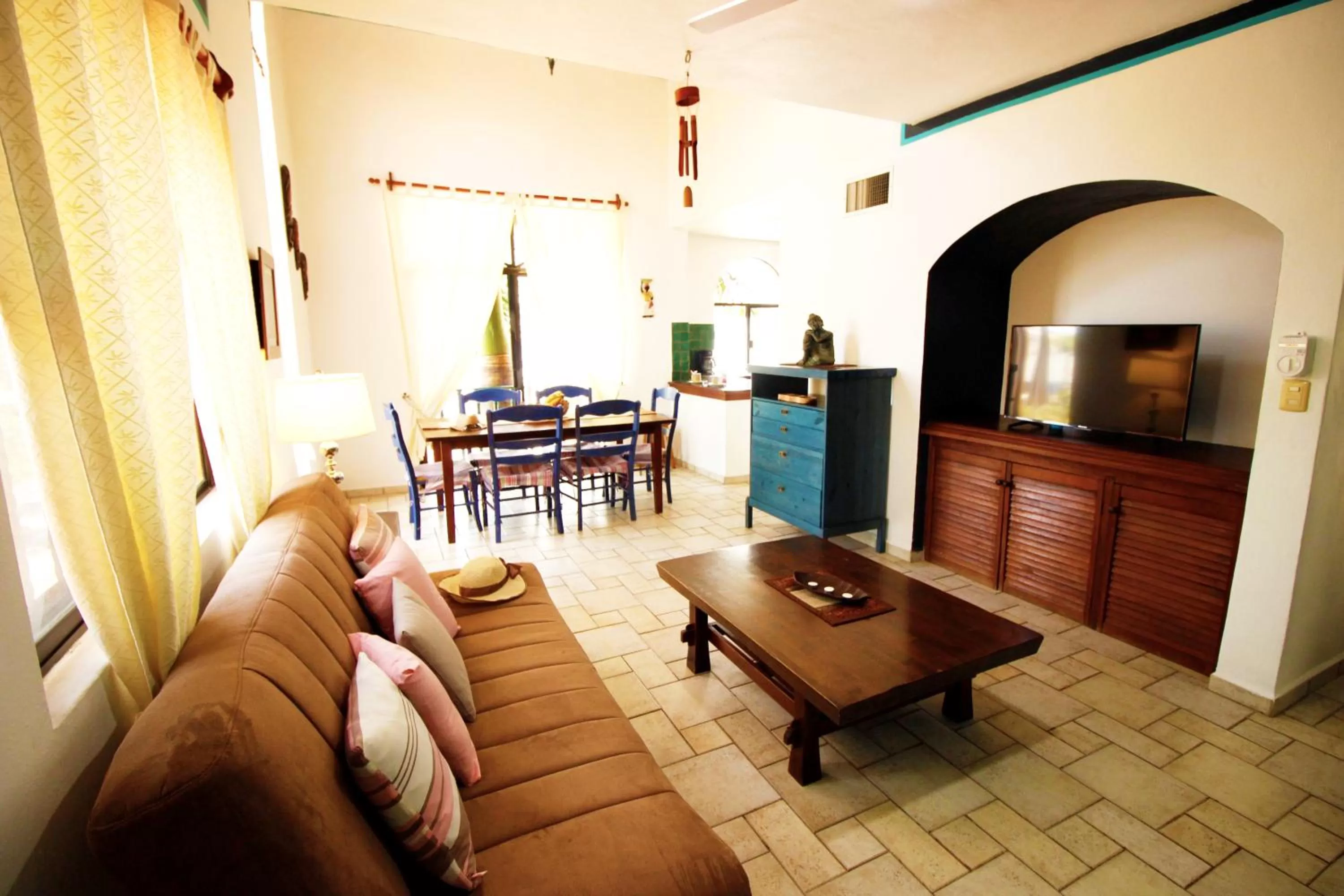 Communal lounge/ TV room in Maya Vacanze Playa Alegria