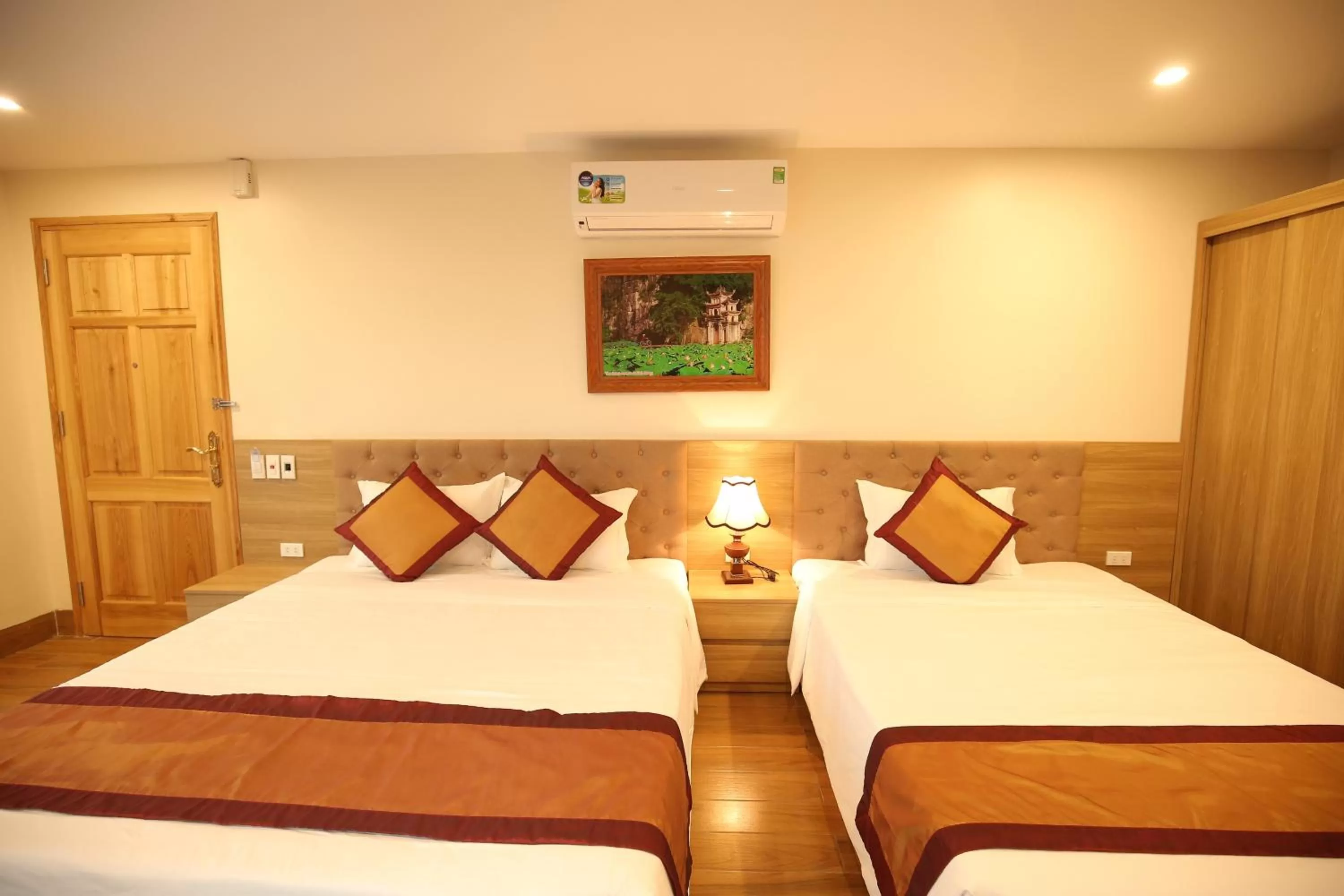 Bed in Cozynibi Hotel