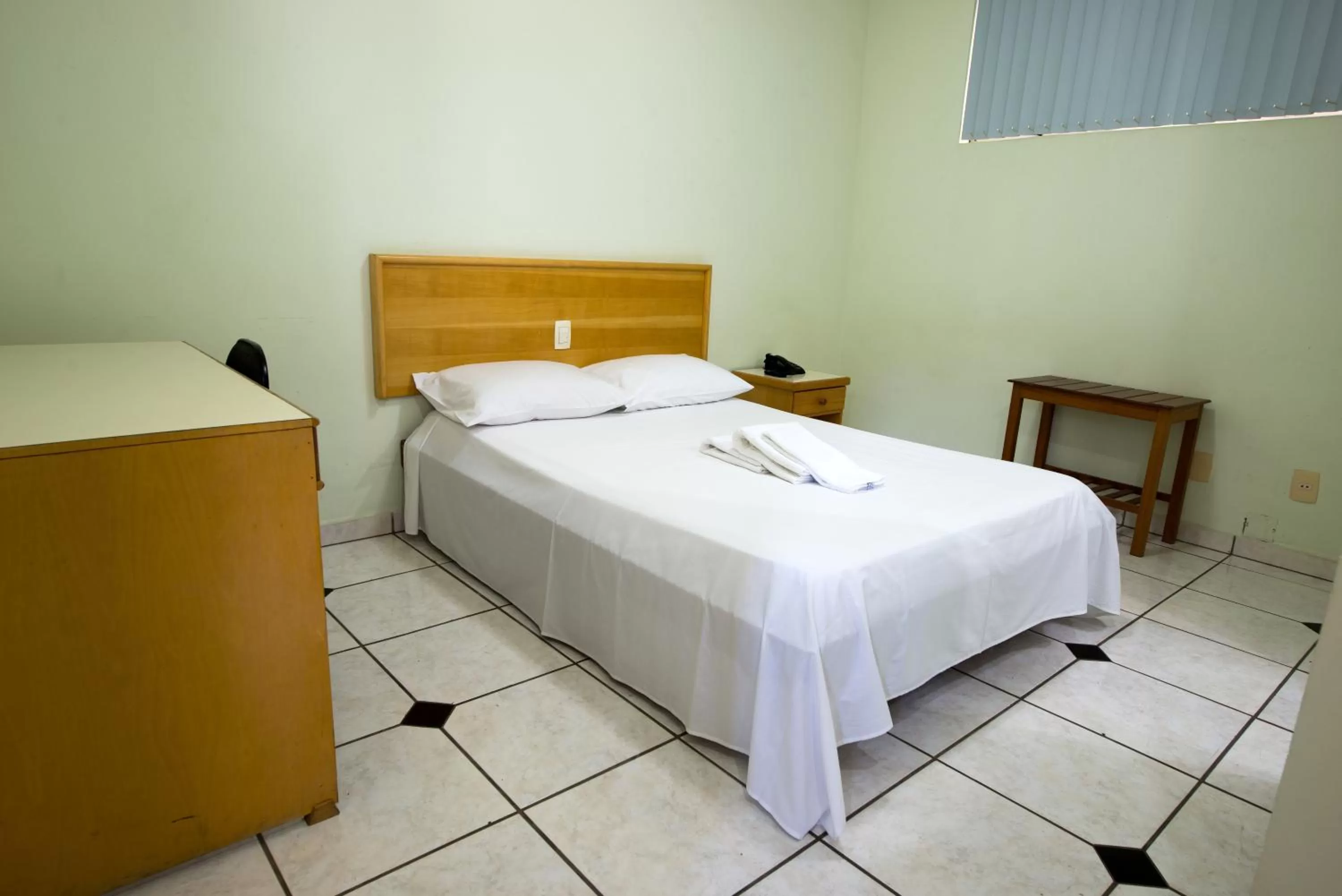 Bed in Hotel Metropolitano