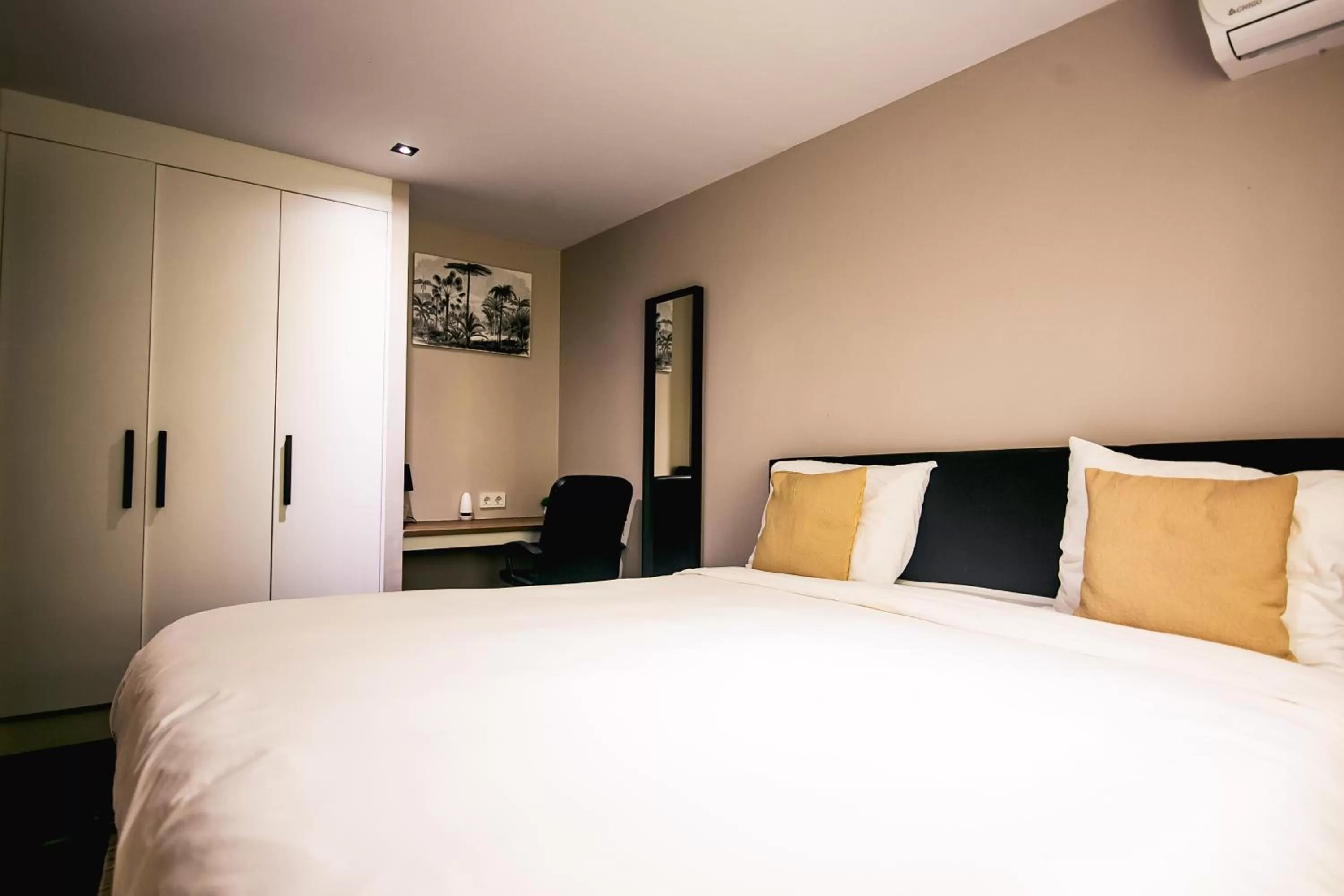 Bed in Bronbella Villa Residence