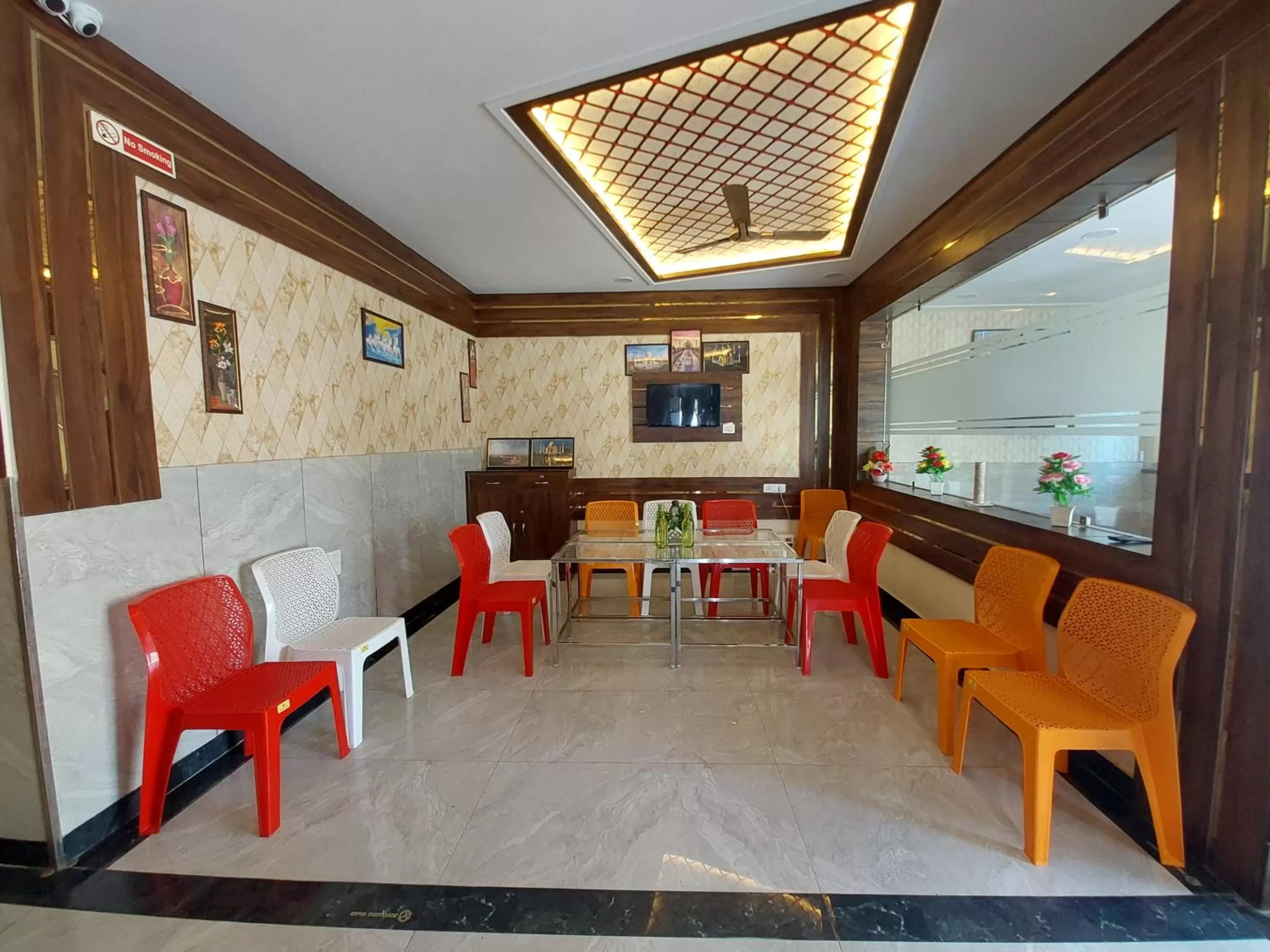Seating area, Restaurant/Places to Eat in Taj Nice Point Manage by Taj Sunrise Group