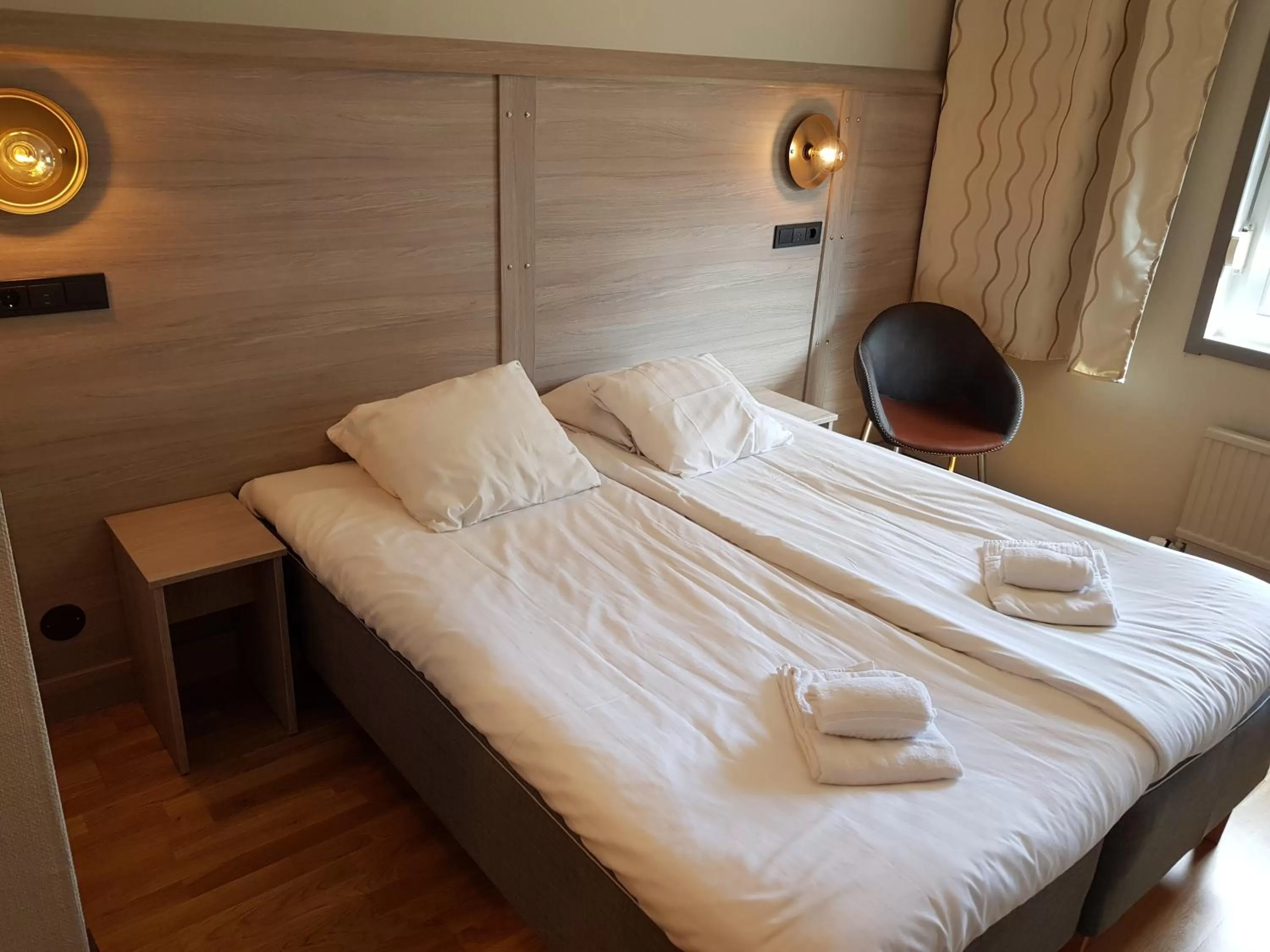 Bed in Hotell Stinsen