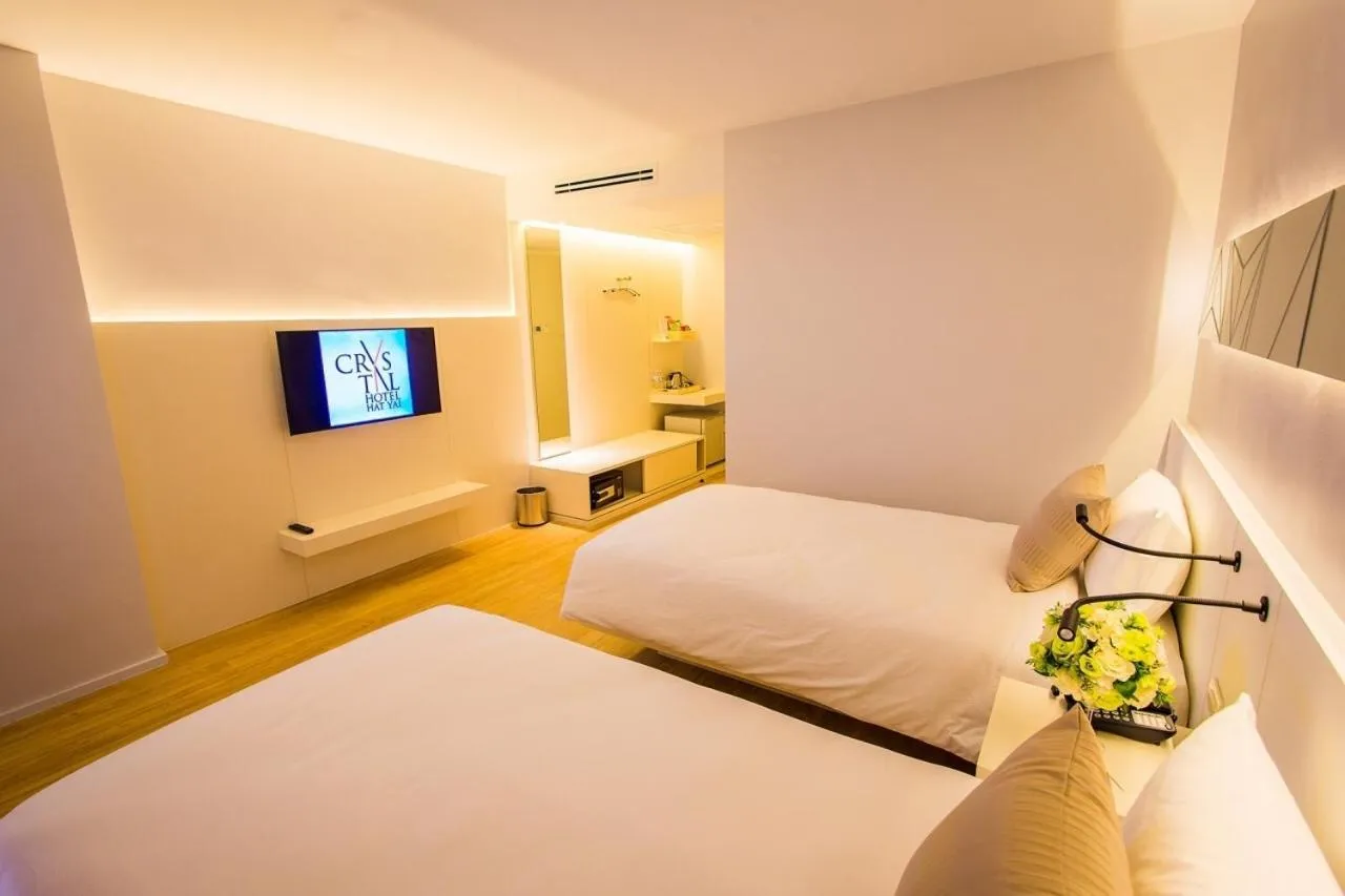 Photo of the whole room, Bed in Crystal Hotel Hat Yai