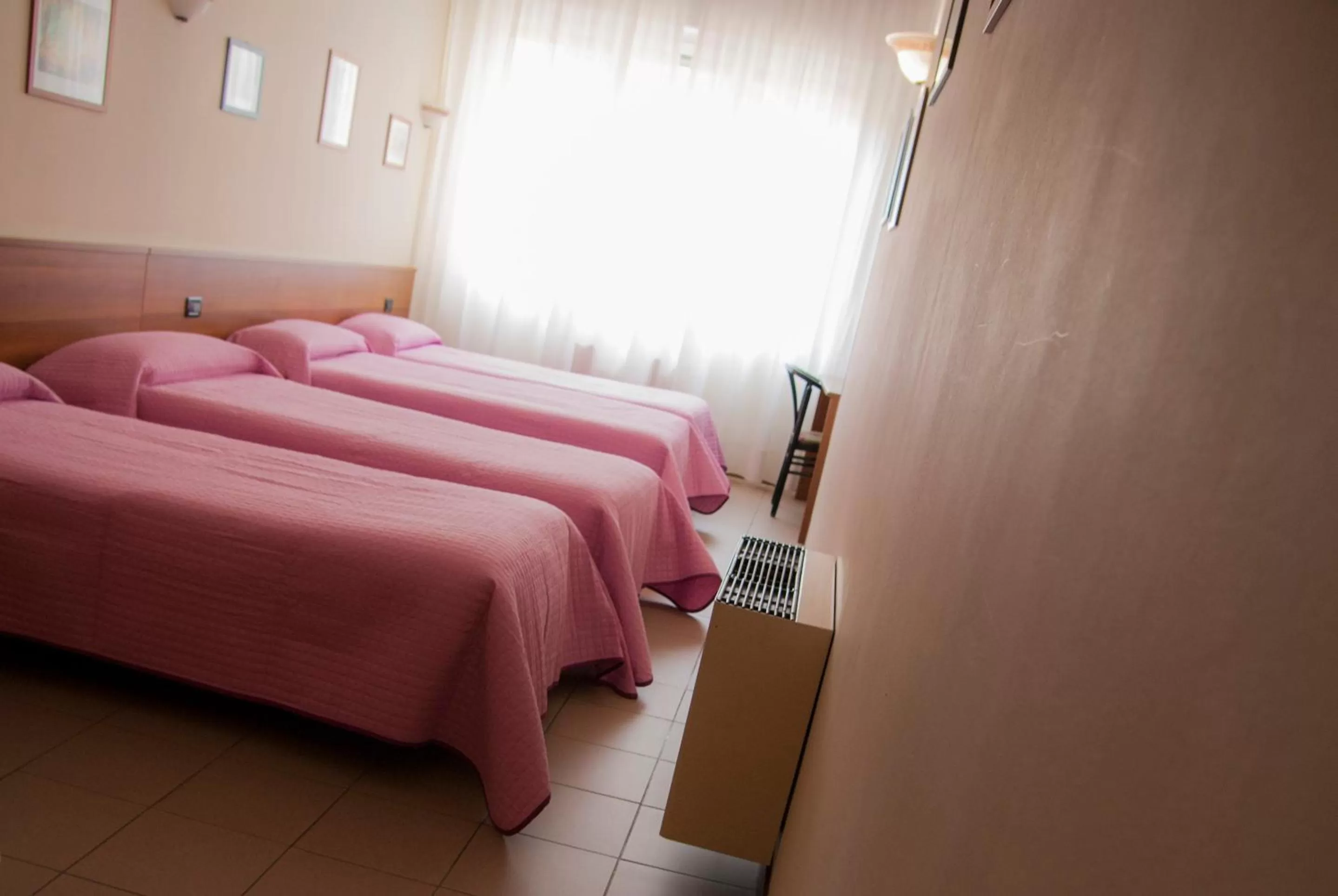 Bed in Hotel Marinoni