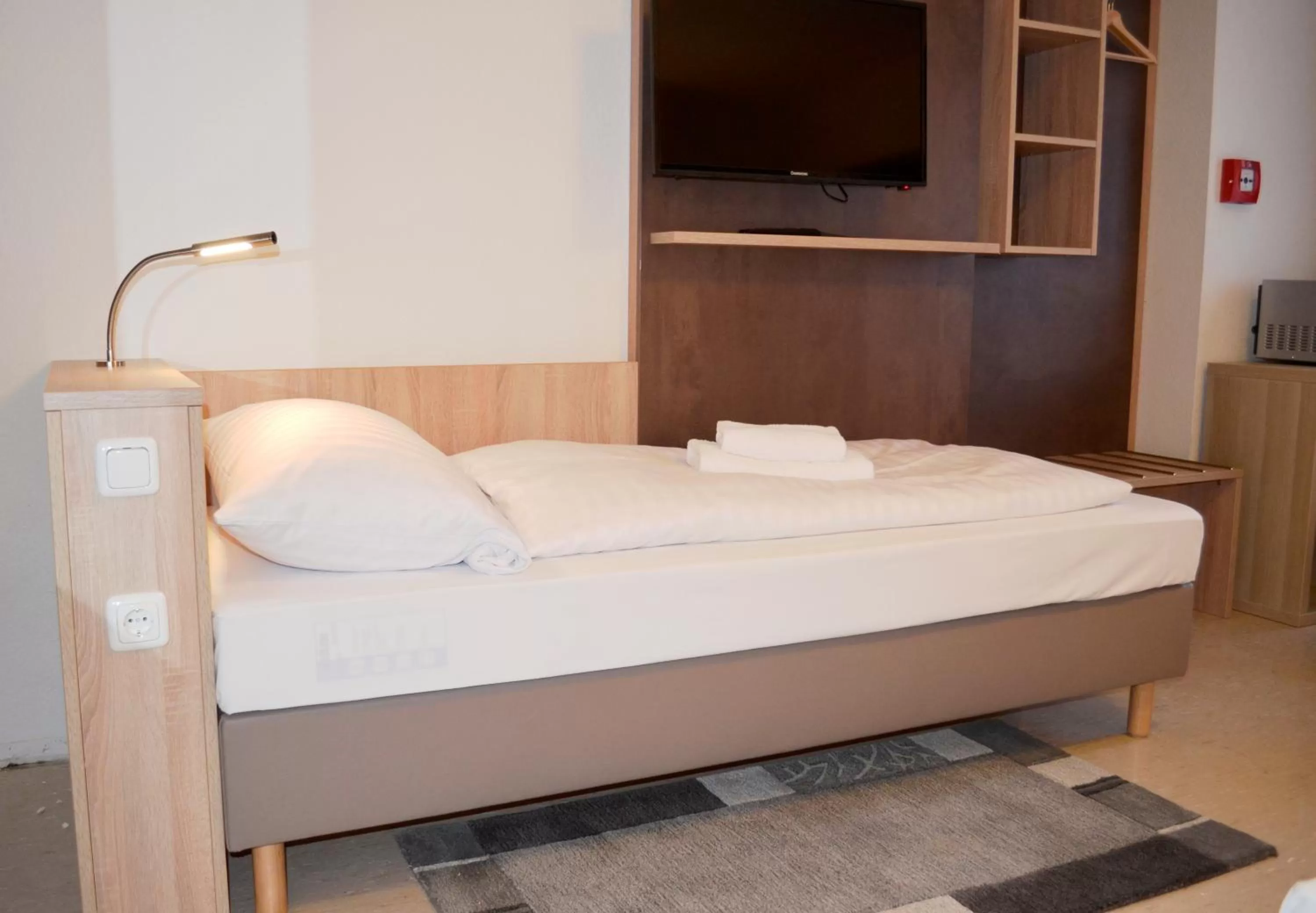 Bed in Hana Aparthotel