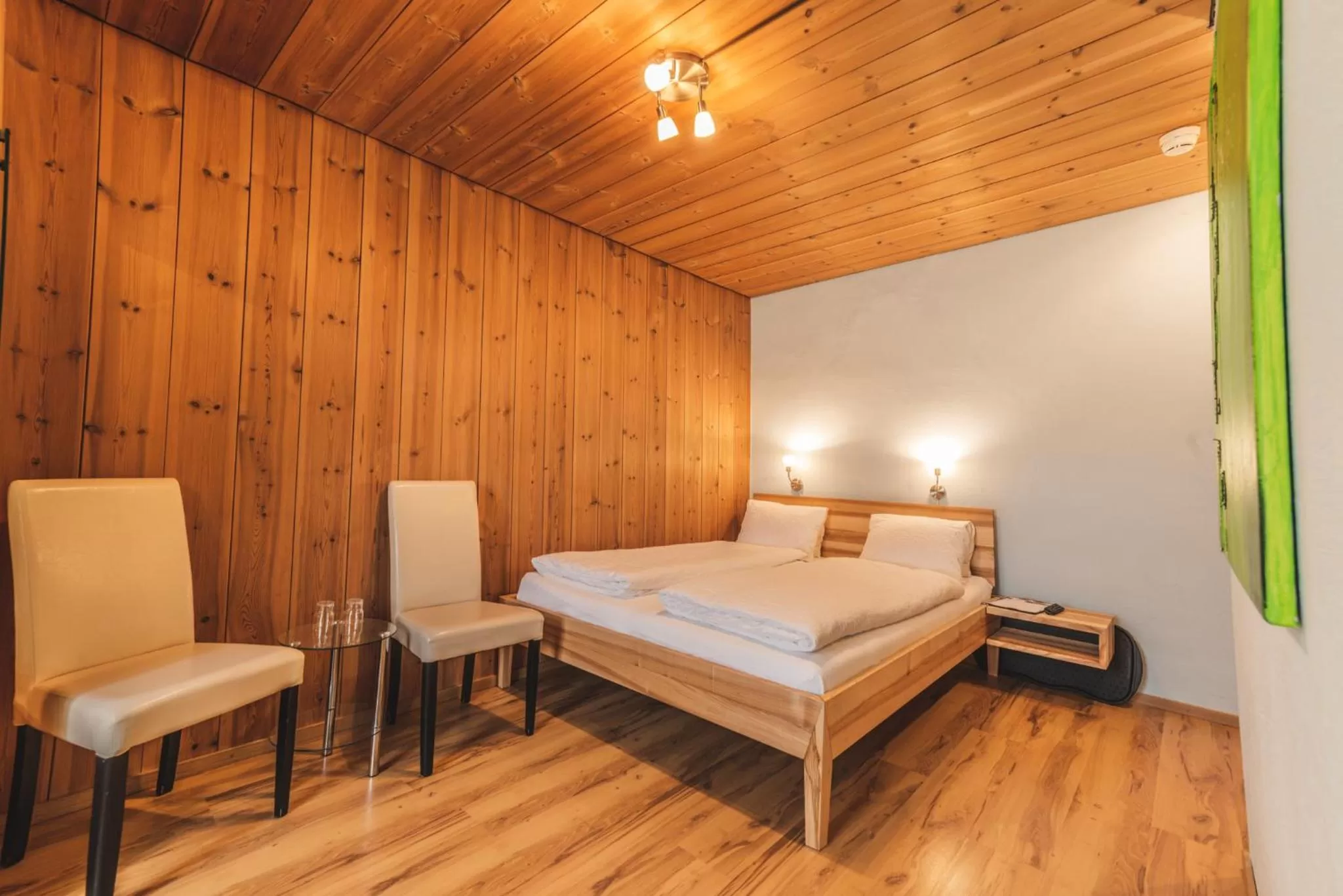 Photo of the whole room, Bed in CURUNA Hotel-Garni