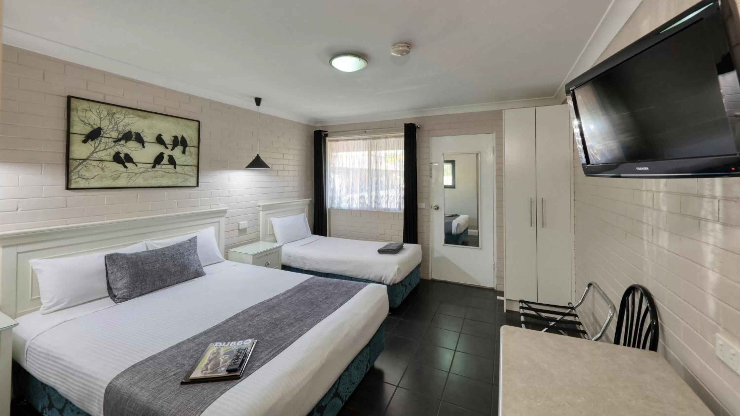 Bed in Country Leisure Motor Inn