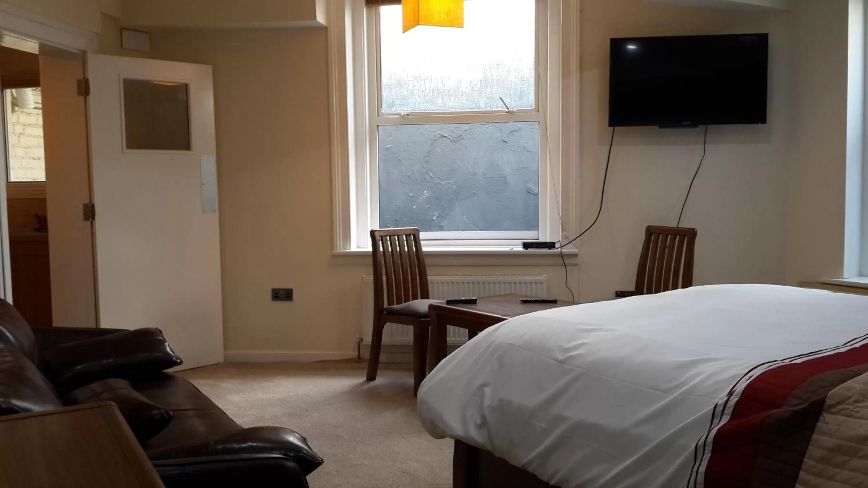 Bed in The Manchester Hotel