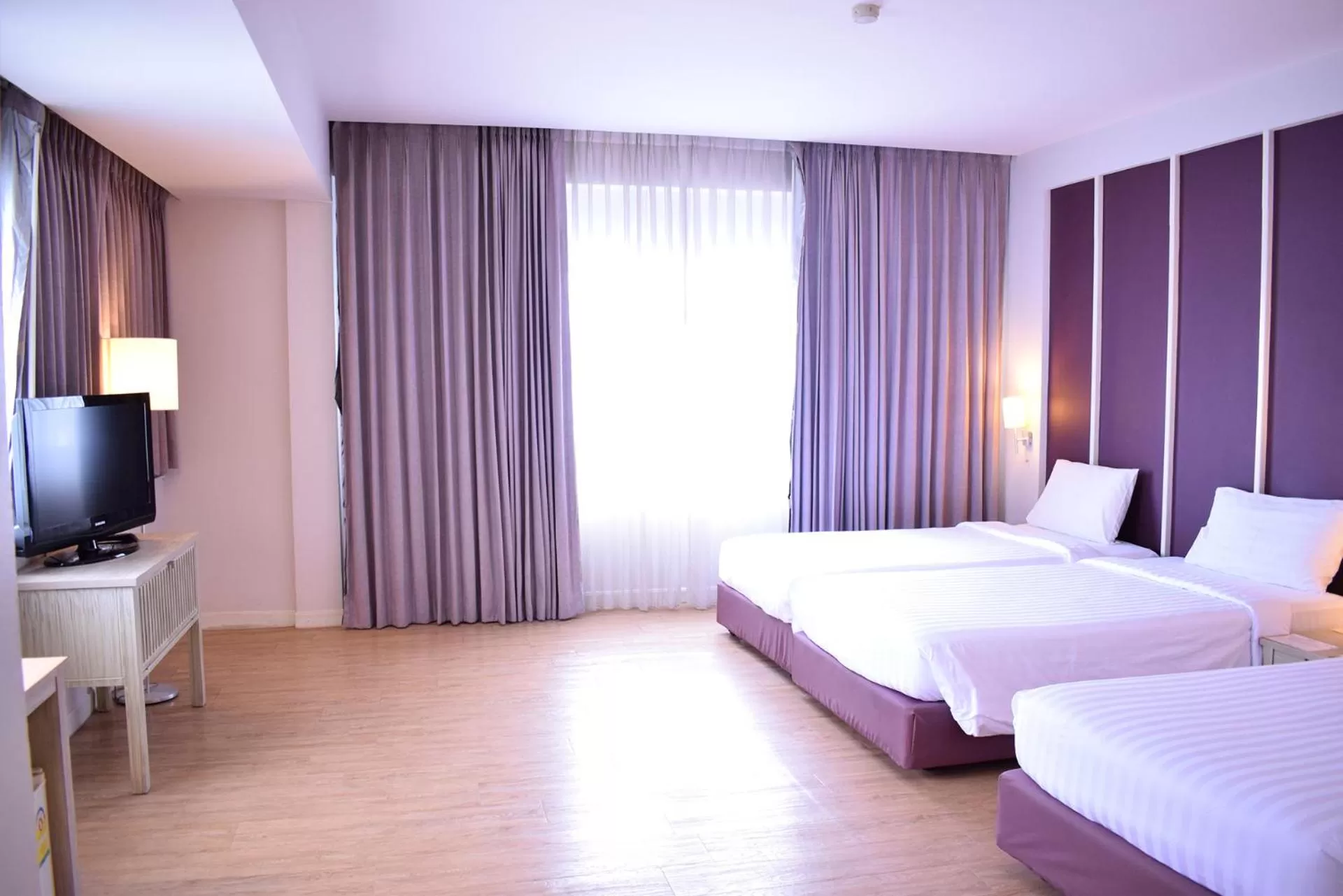 Bed in Trang Hotel Bangkok - SHA Plus