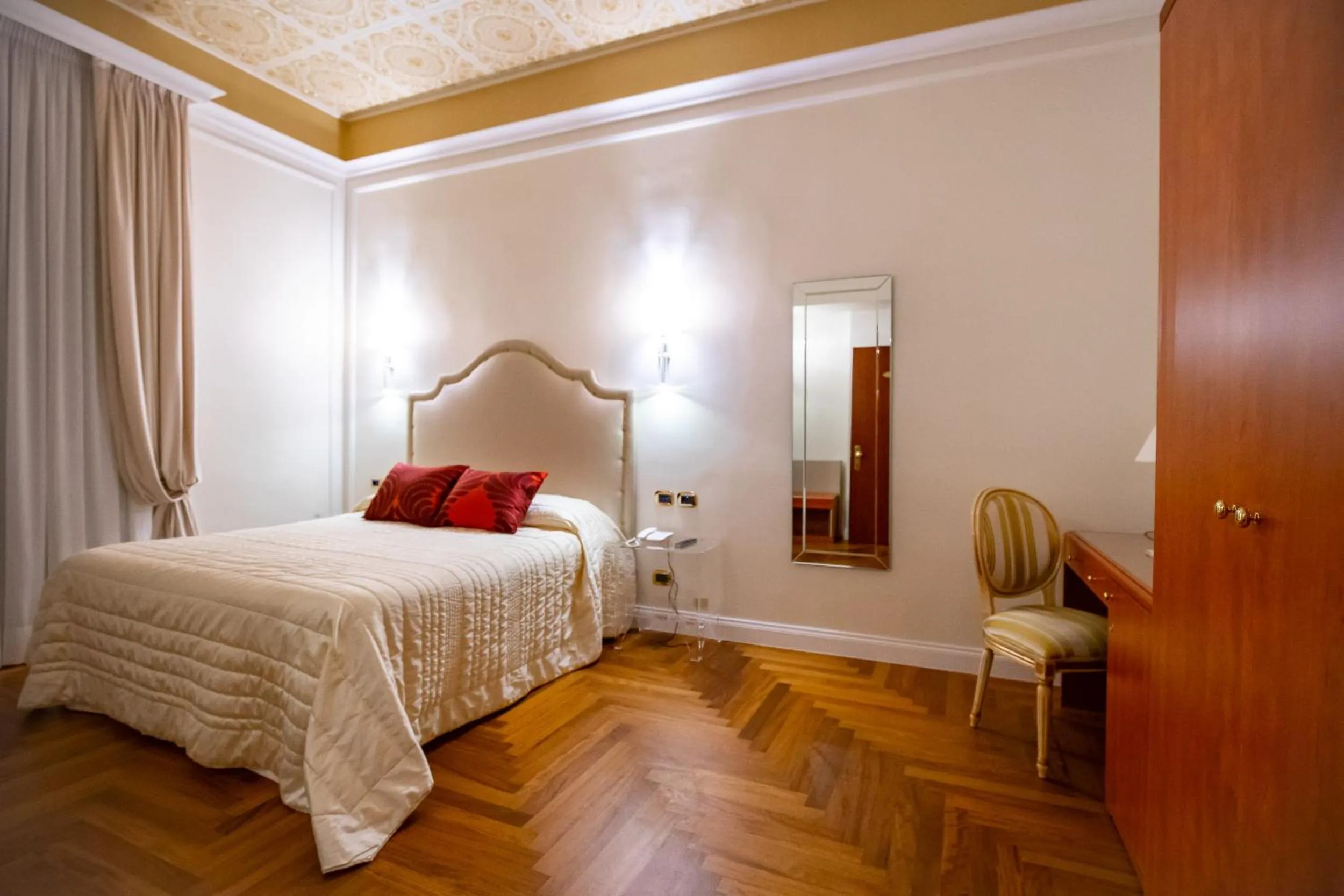 Bed in Boutique Hotel Puccini