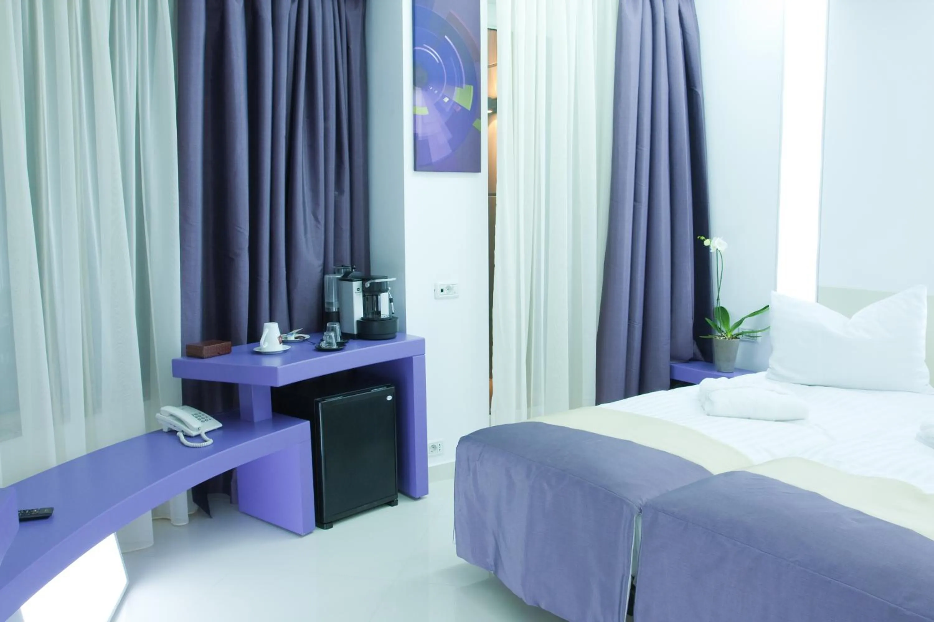 Bed in Christina Hotel