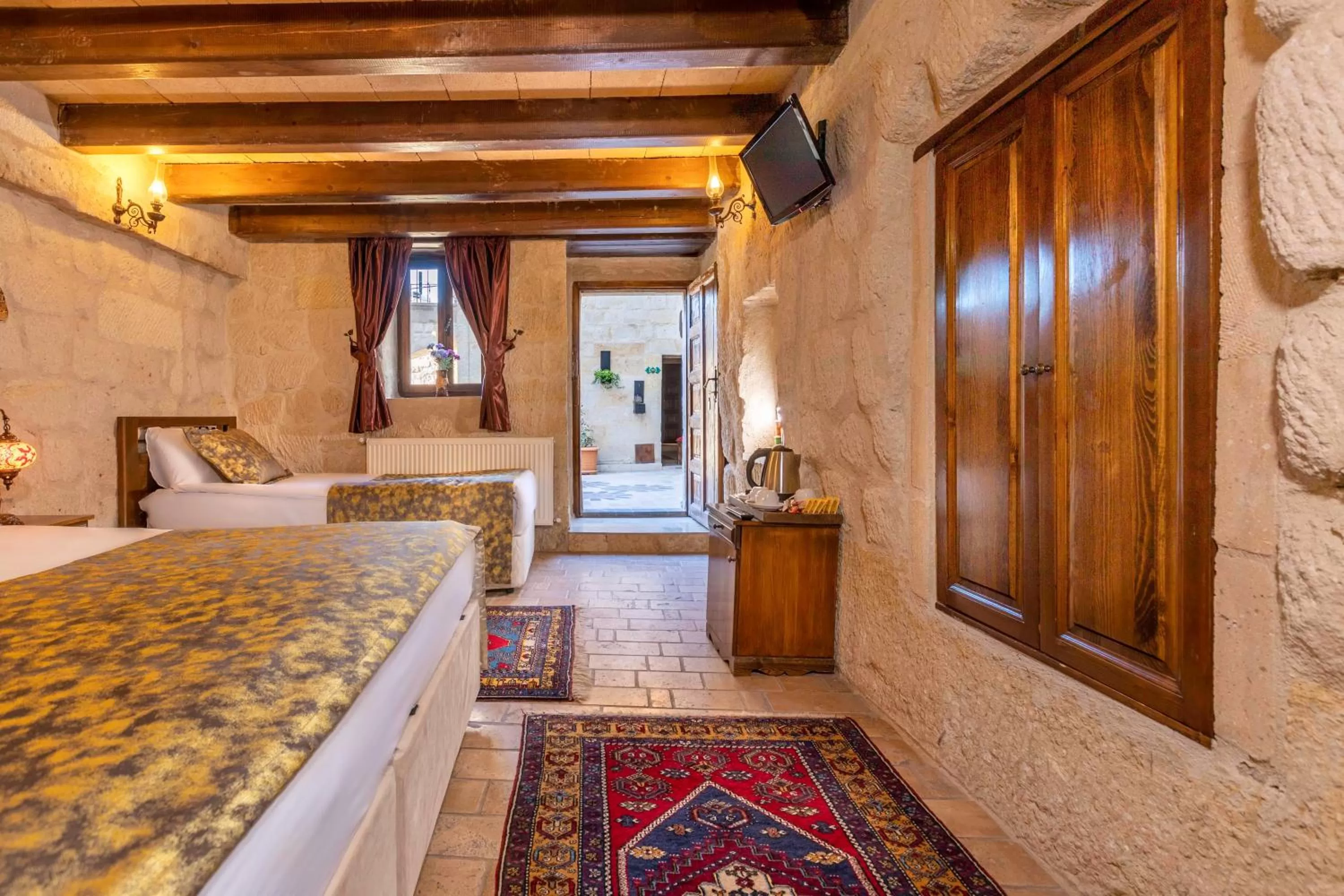 Bed in Adora Cave Suites -