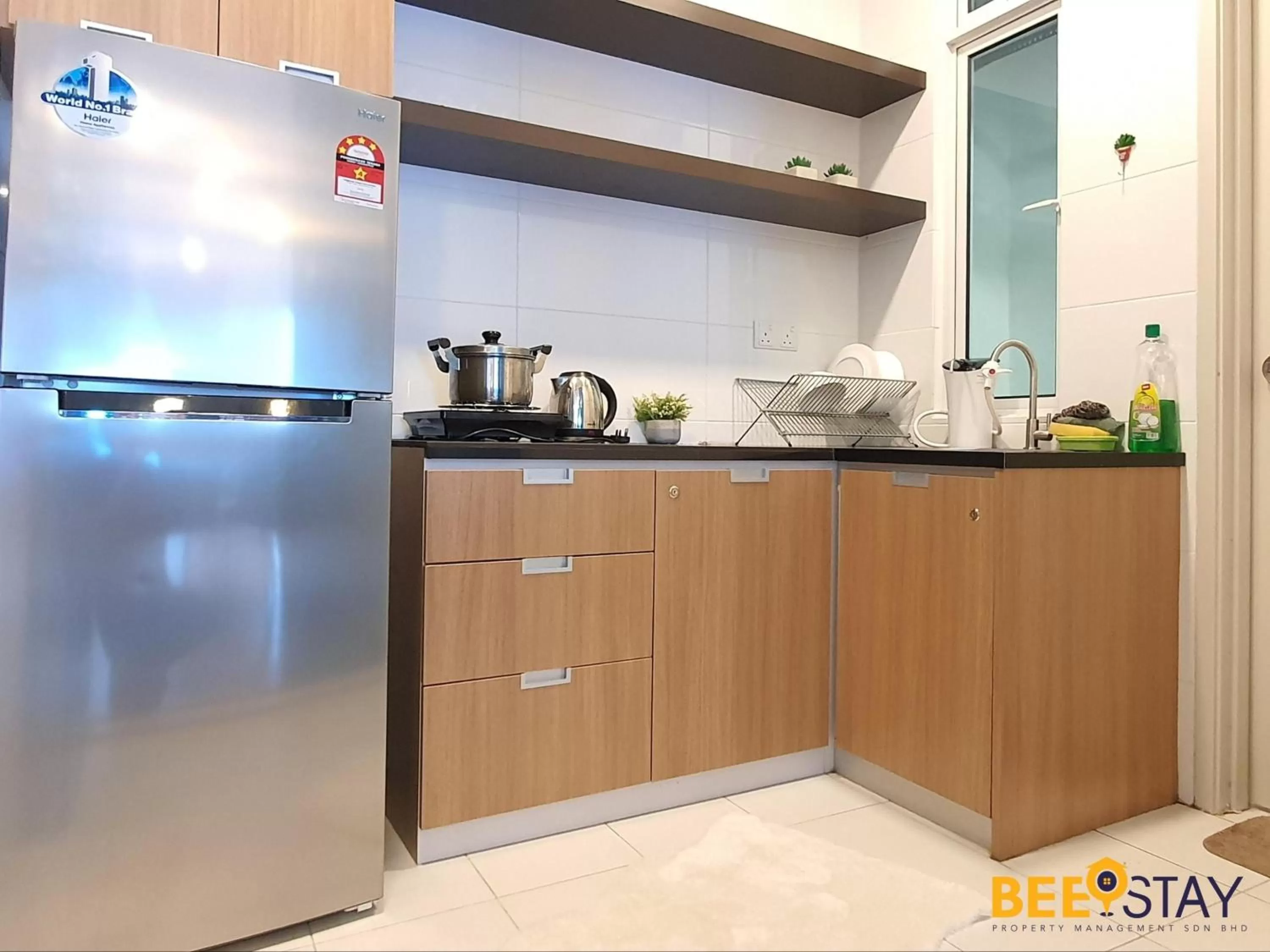 Kitchen/Kitchenette in The Wave Suites Melaka by BEESTAY