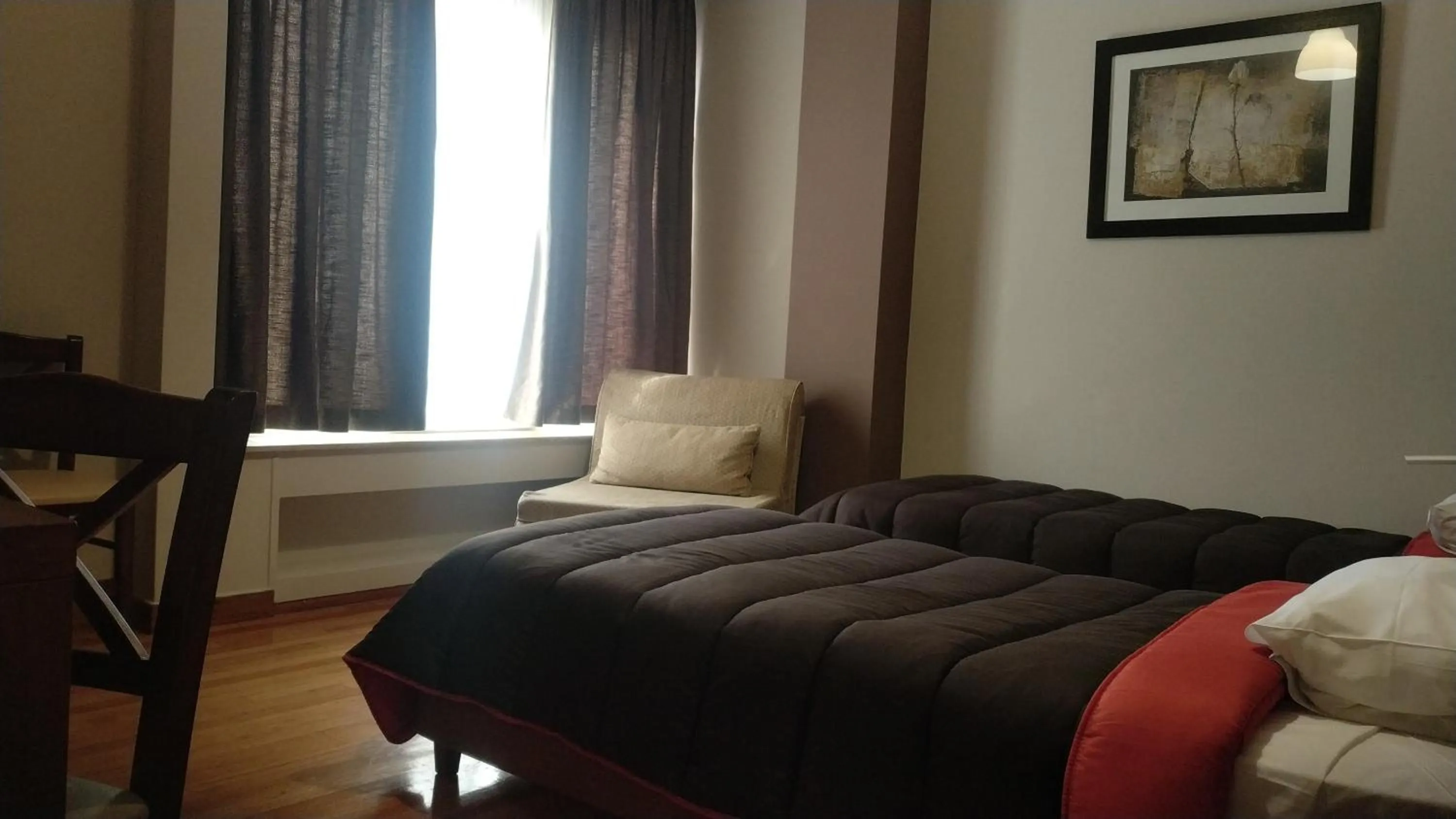 Bed in Ambrosia Suites