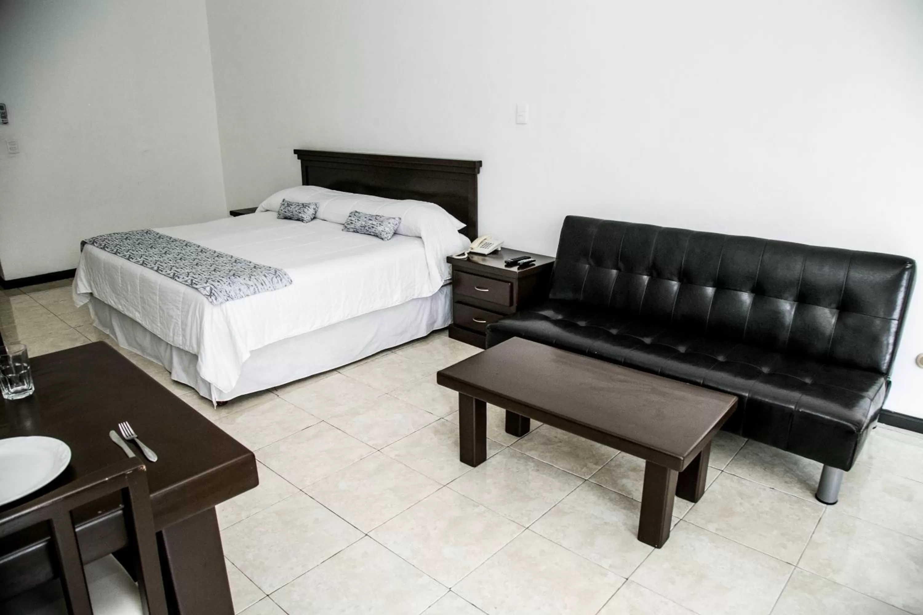 Photo of the whole room, Bed in Booking Dioh