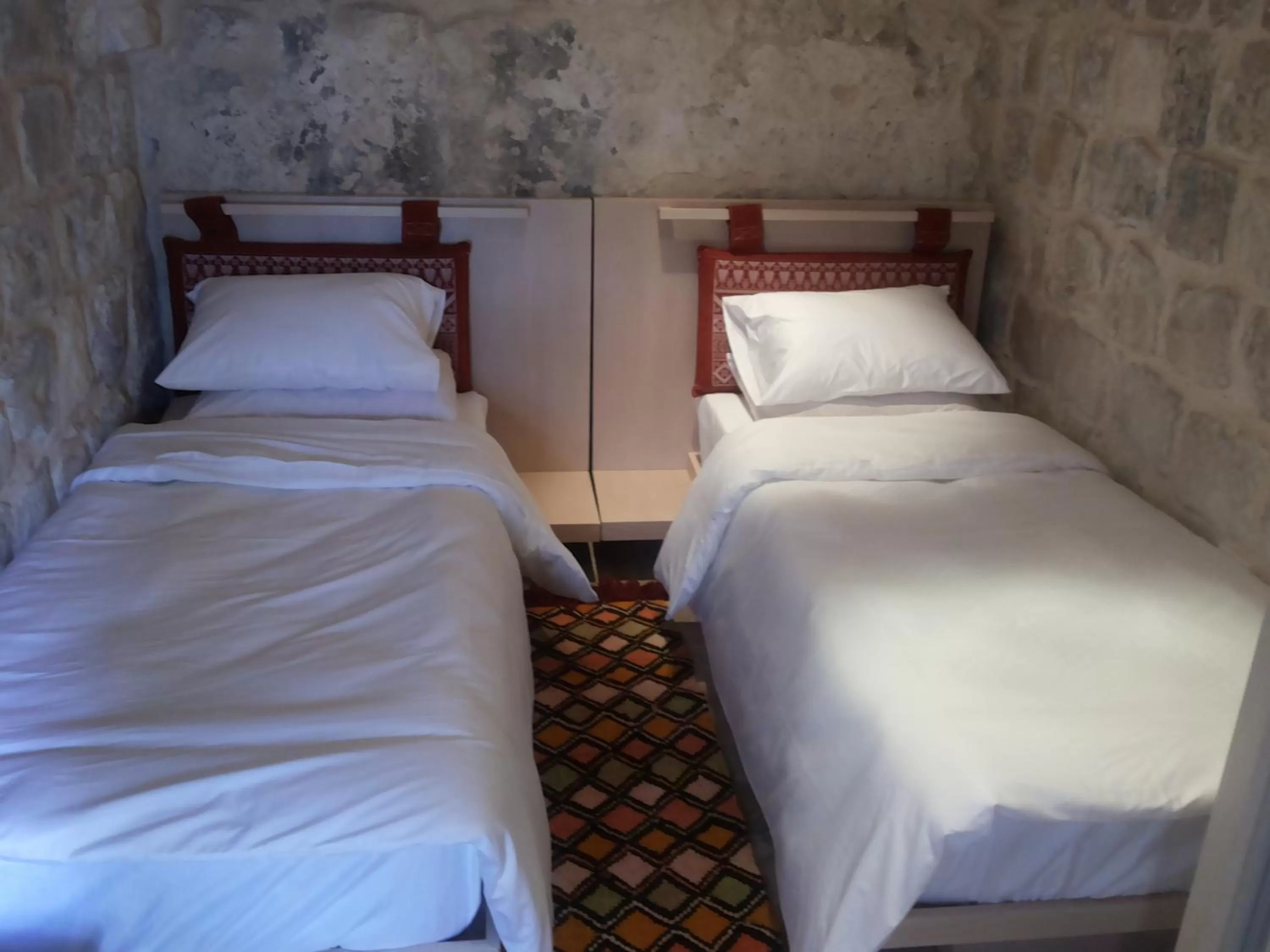 Bed in Khan Alwakala Hotel