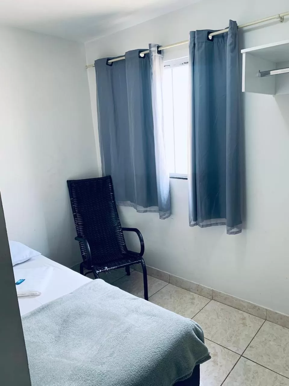 Bed, TV/Entertainment Center in Hotel Central de Anápolis