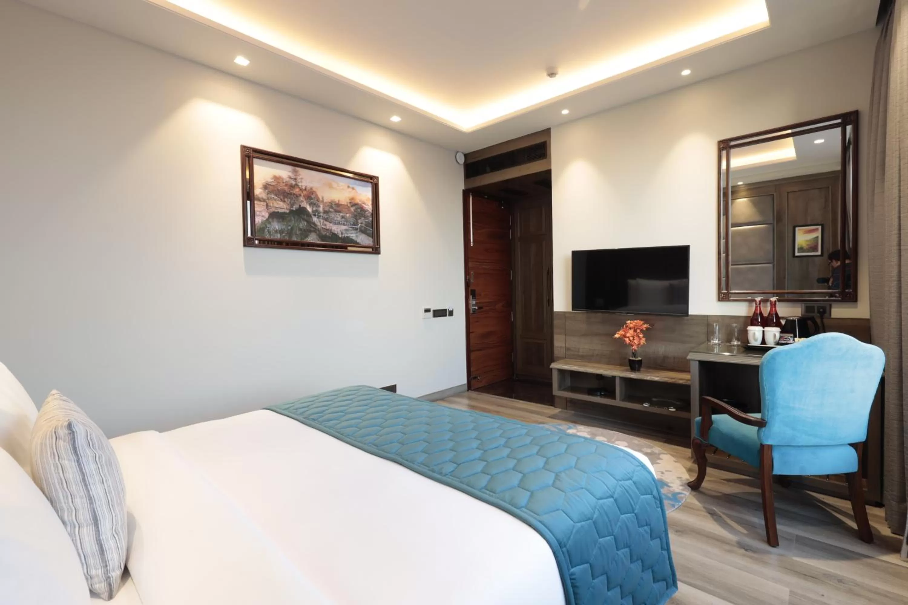 Bed in WelcomHeritage Elysium Resort & Spa