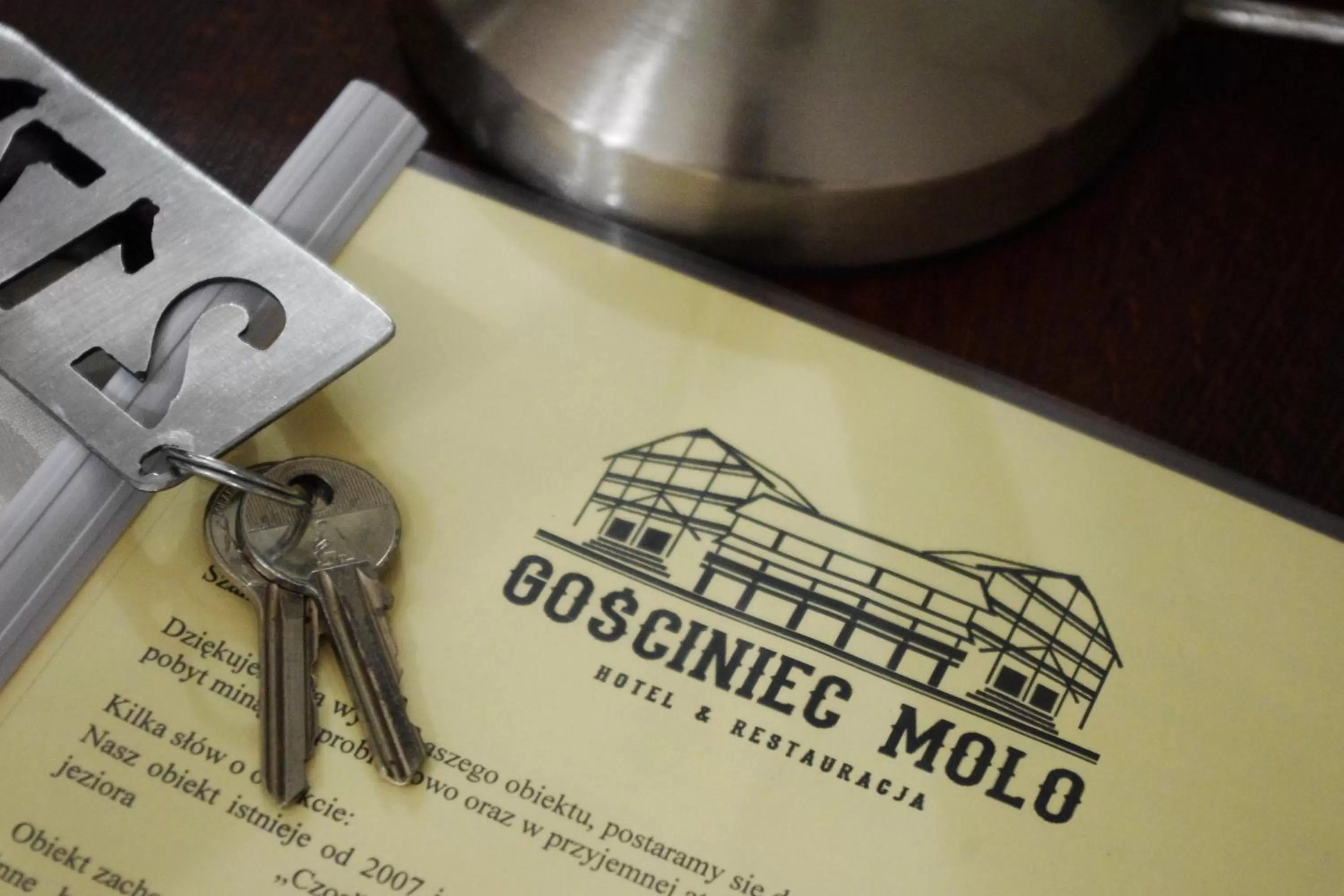 Property logo or sign in Gościniec Molo