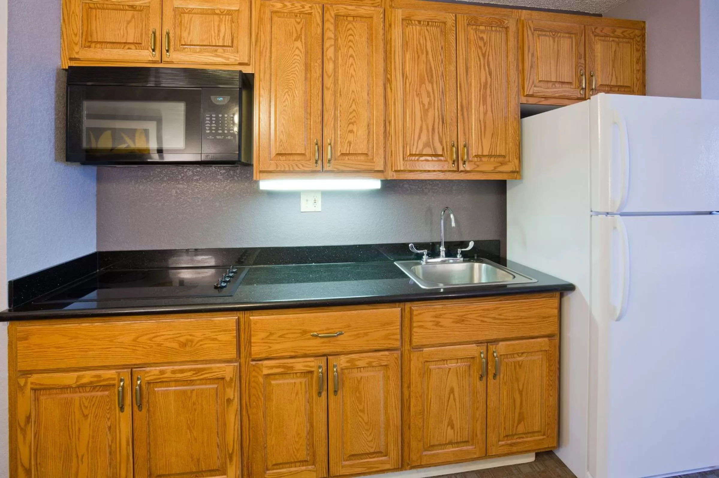 Kitchen or kitchenette in AmericInn by Wyndham Ankeny/Des Moines
