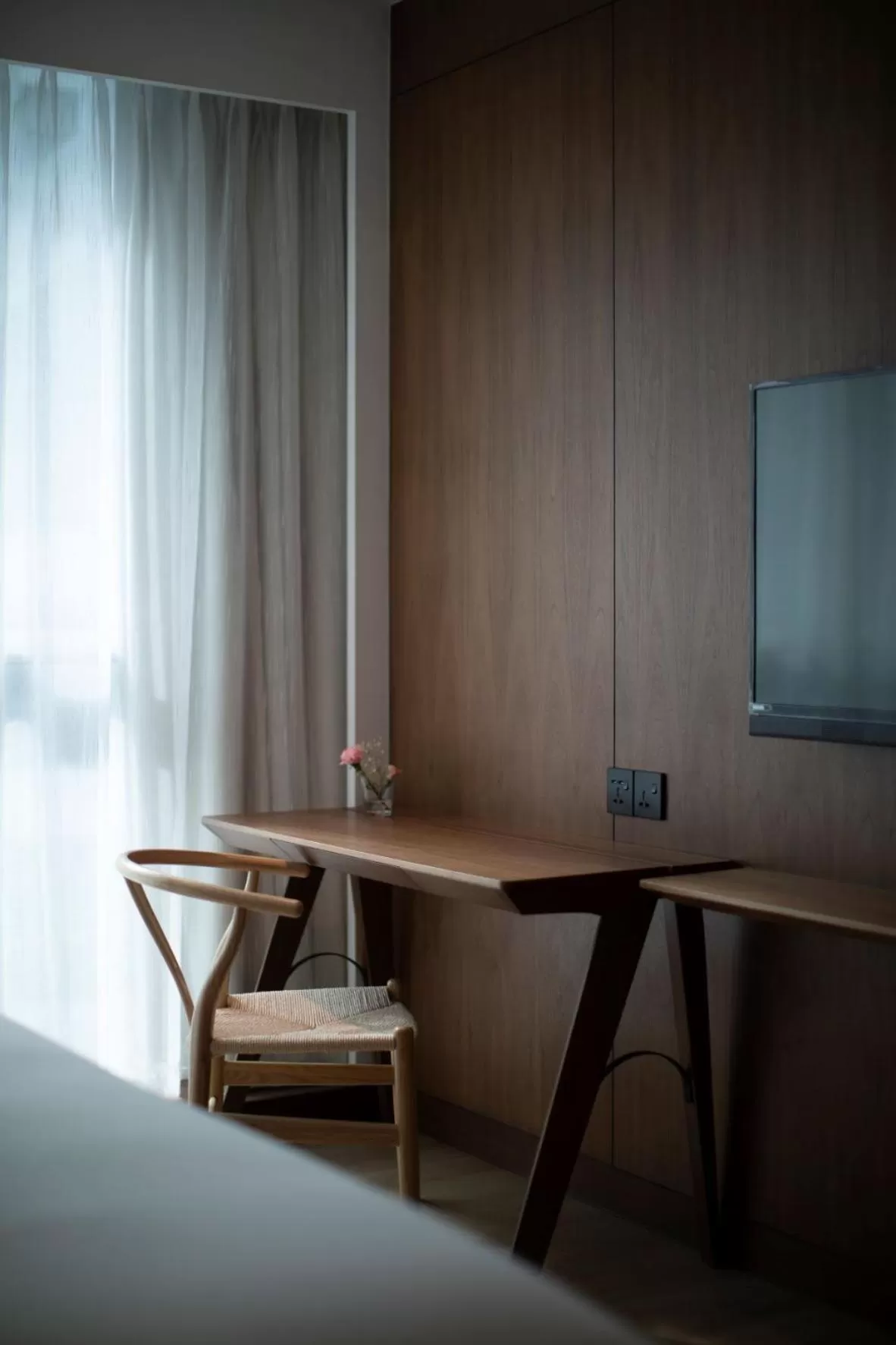 Bed in The LUMA Hotel, a Member of Design Hotels