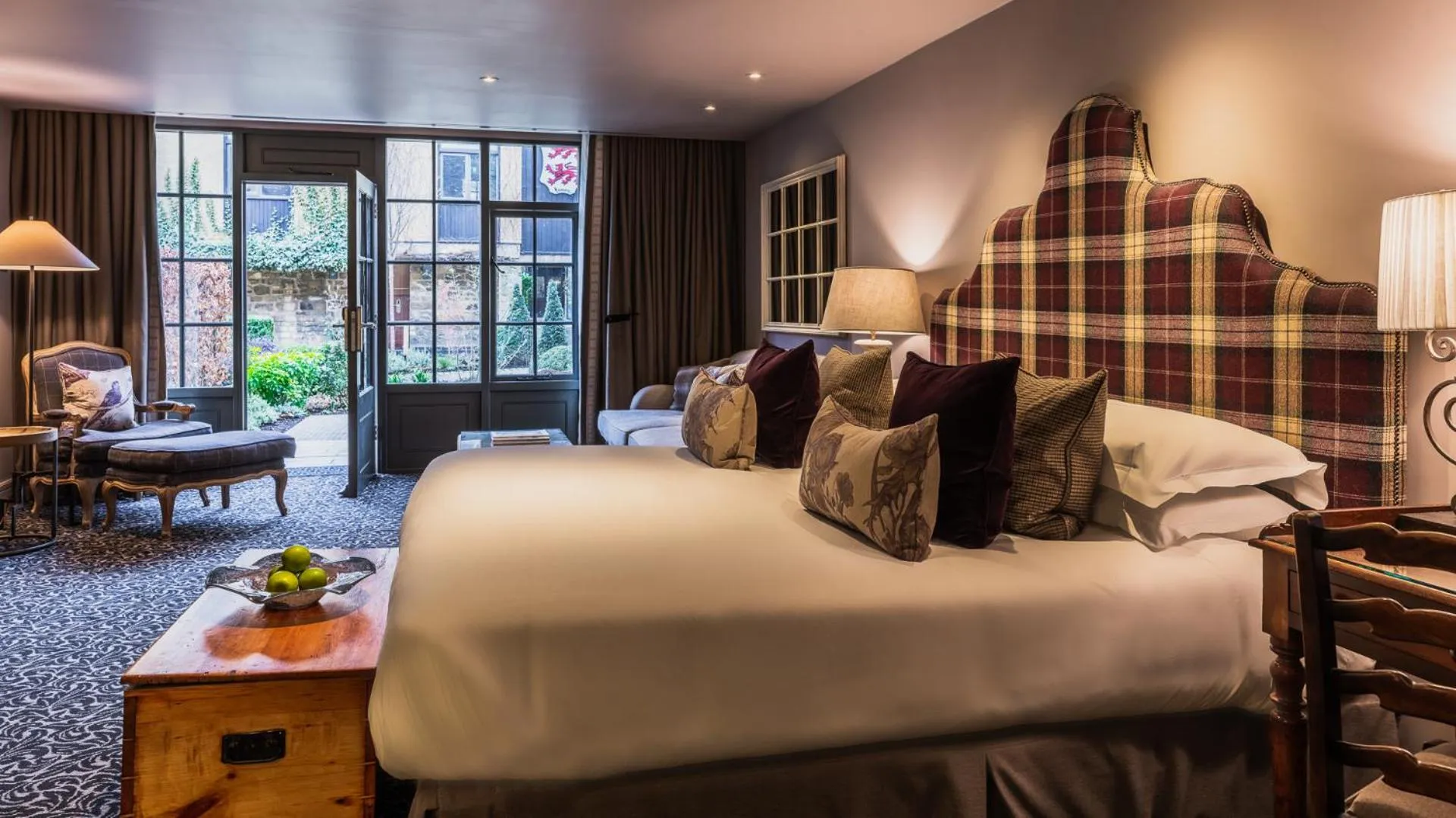 Living room, Bed in The Lygon Arms - an Iconic Luxury Hotel