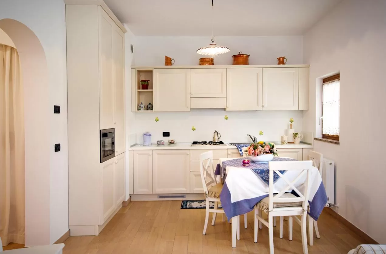 Dining area, Kitchen/Kitchenette in Albergo Diffuso Tolmezzo