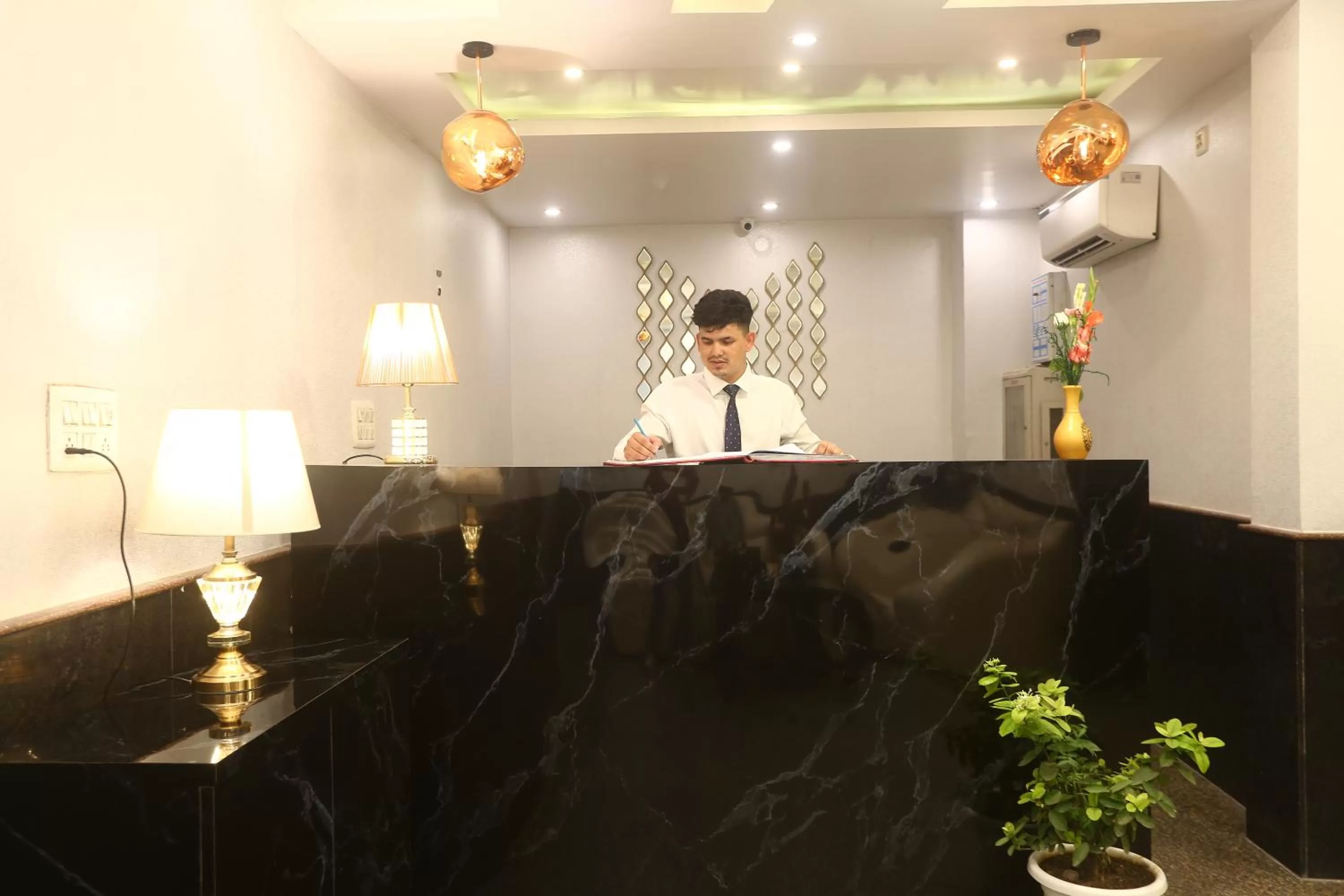 Lobby or reception, Staff in Hotel Earth