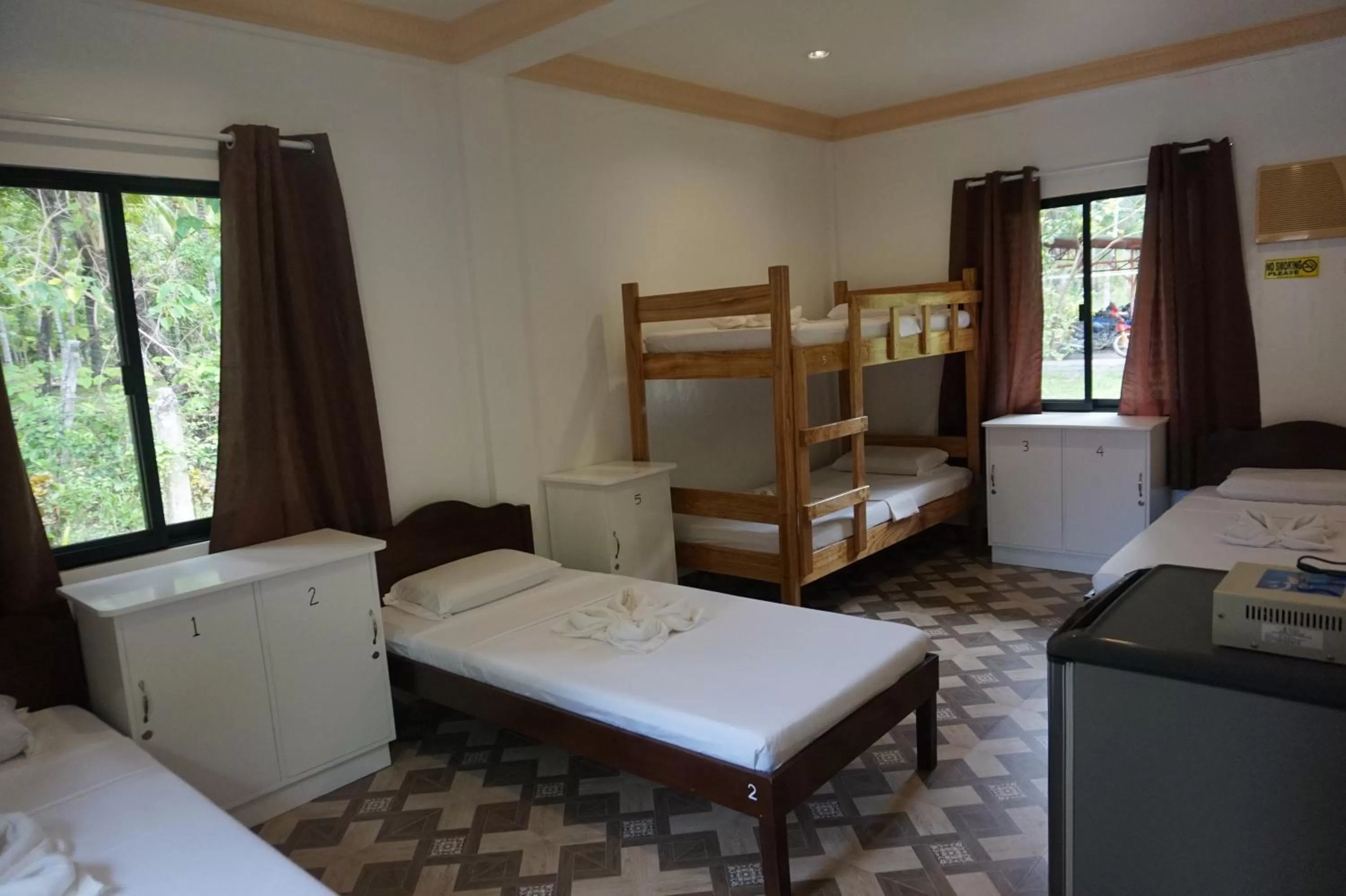 Photo of the whole room, Bed in Wellbeach Dive Resort