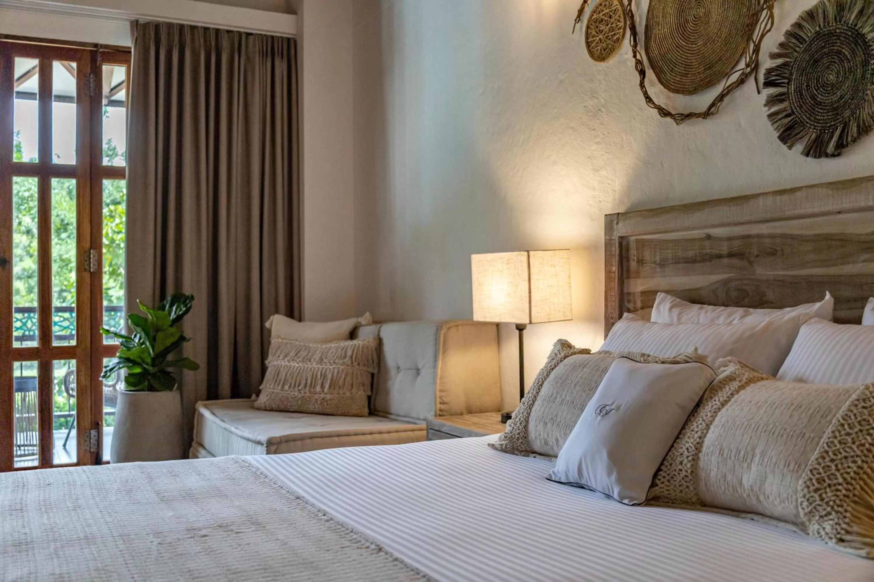 Bed in Casa Jacaranda Hotel Boutique