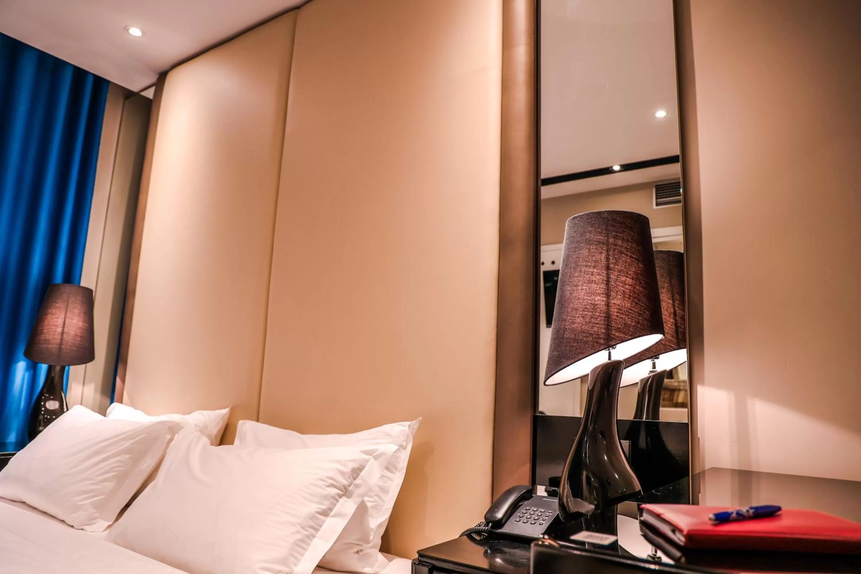 Bed in Senator Hotel