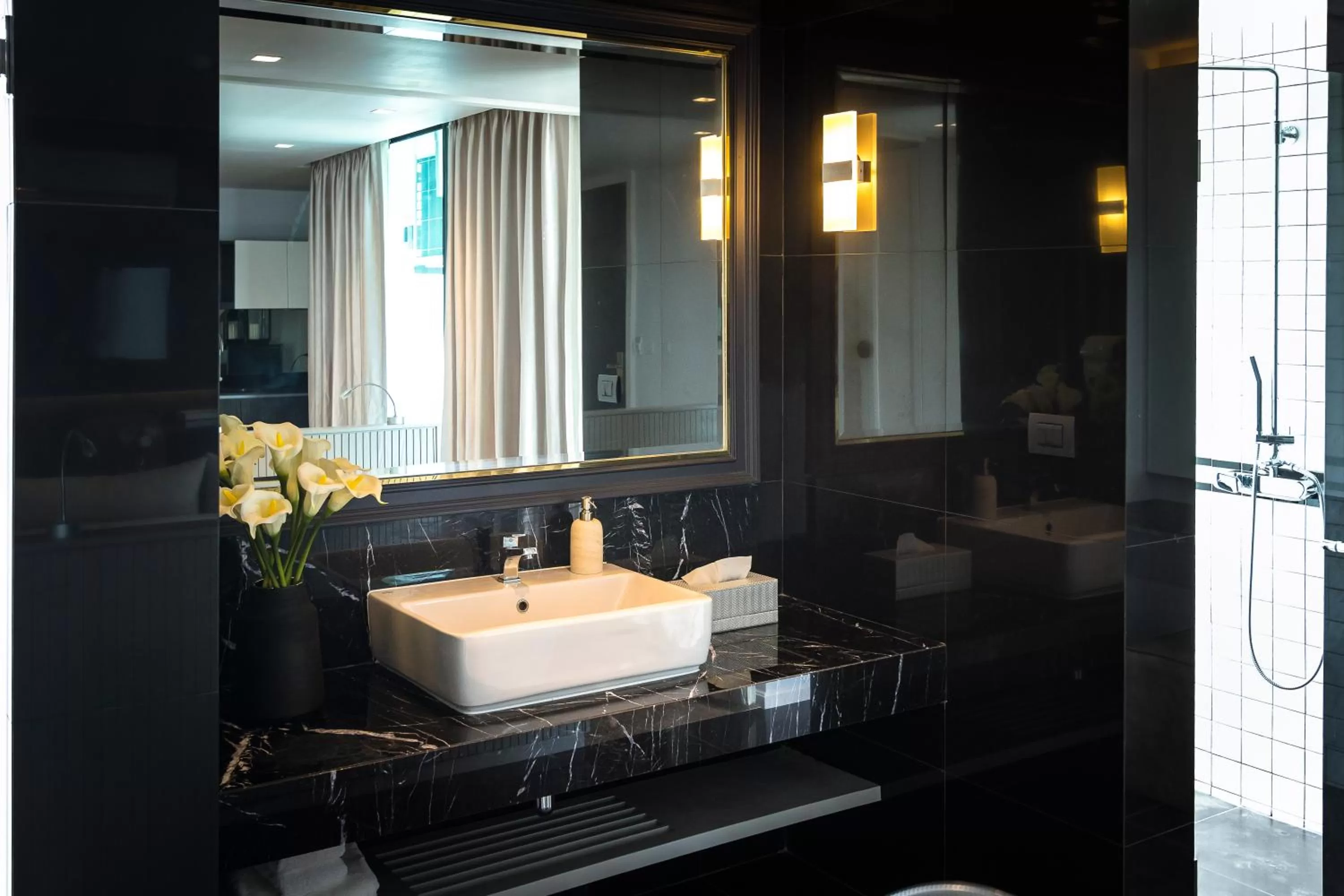 Bathroom in Apartelle Jatujak Hotel