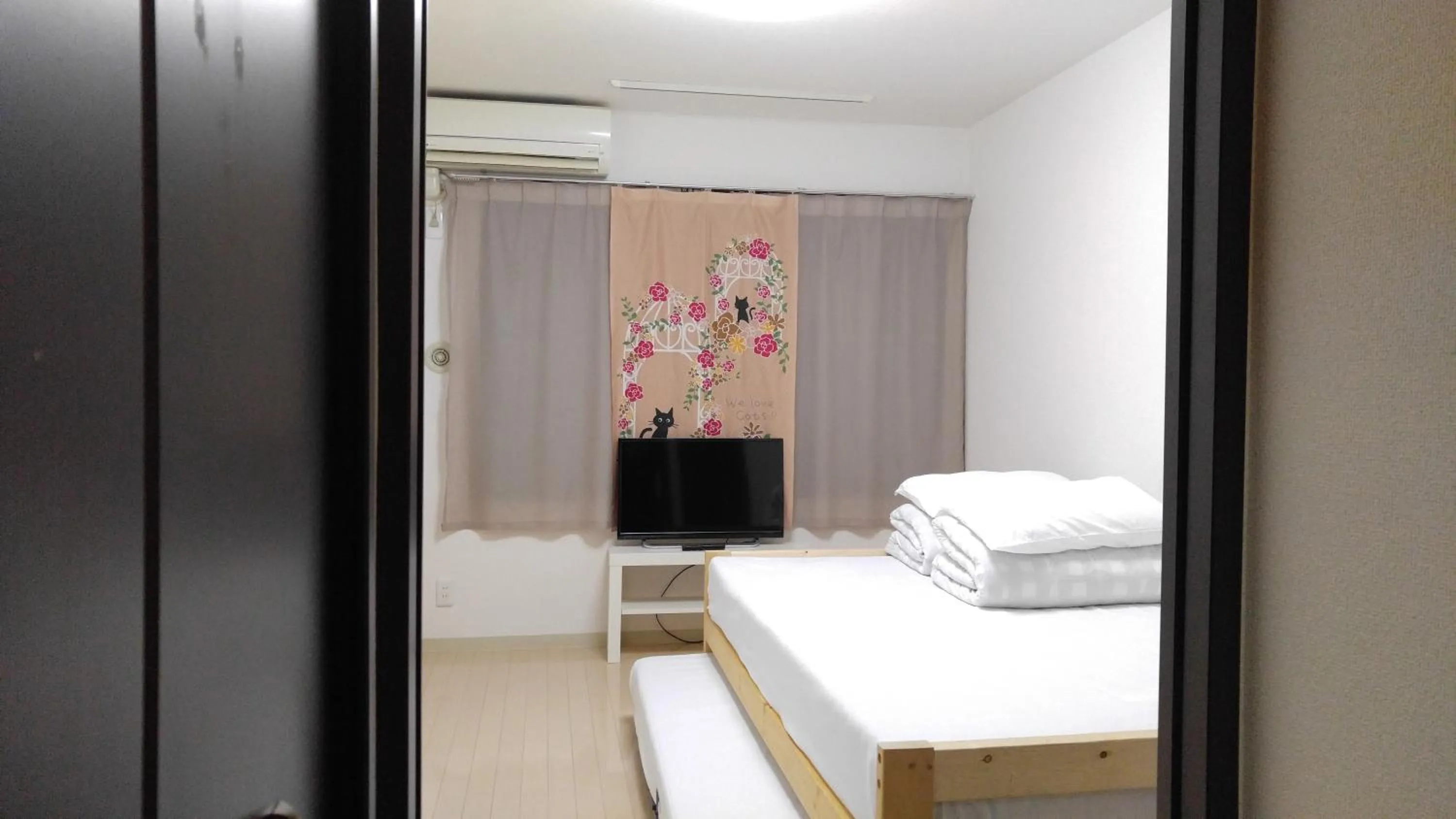 Bed in Sophiearth Apartment