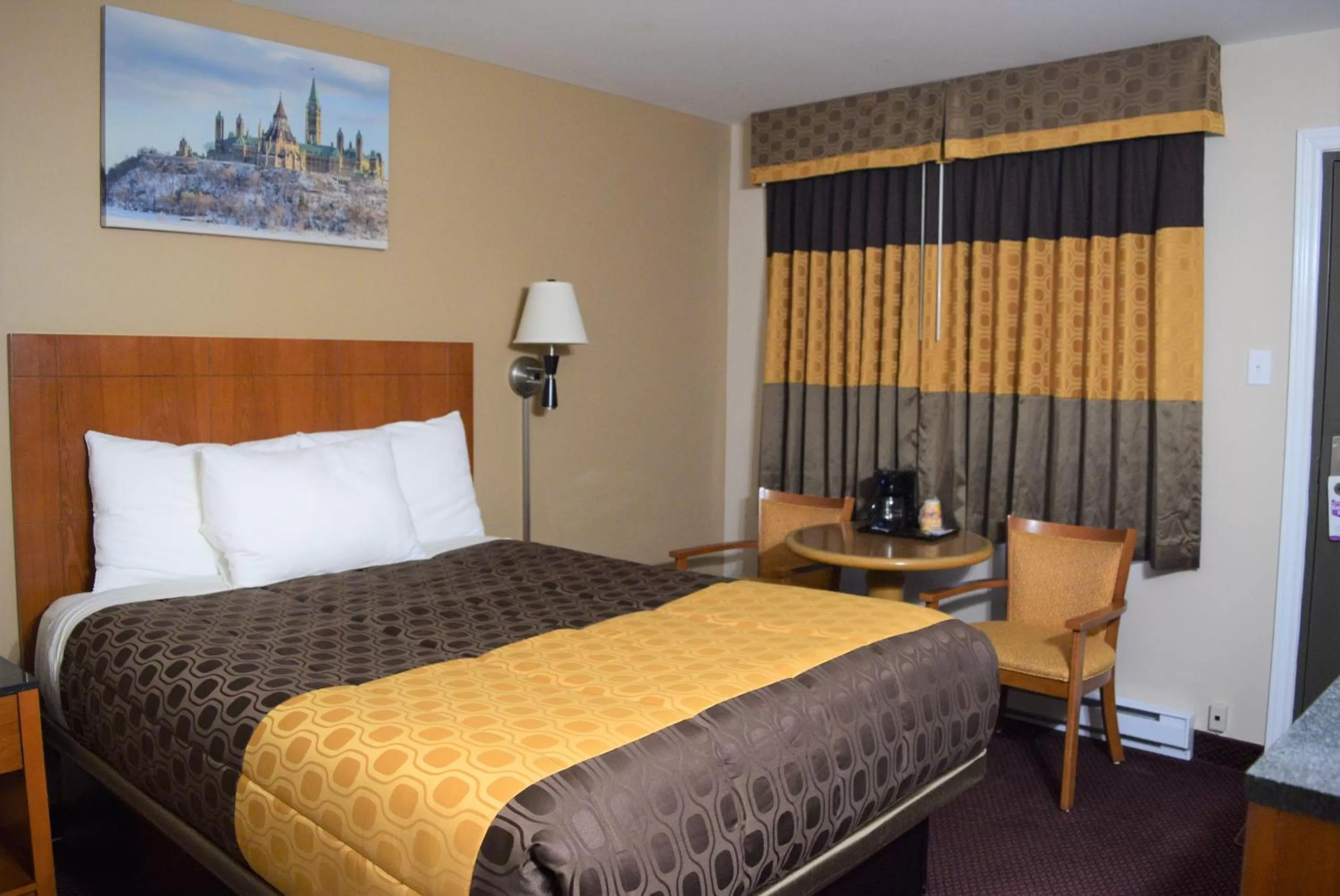 Bed in Knights Inn Arnprior