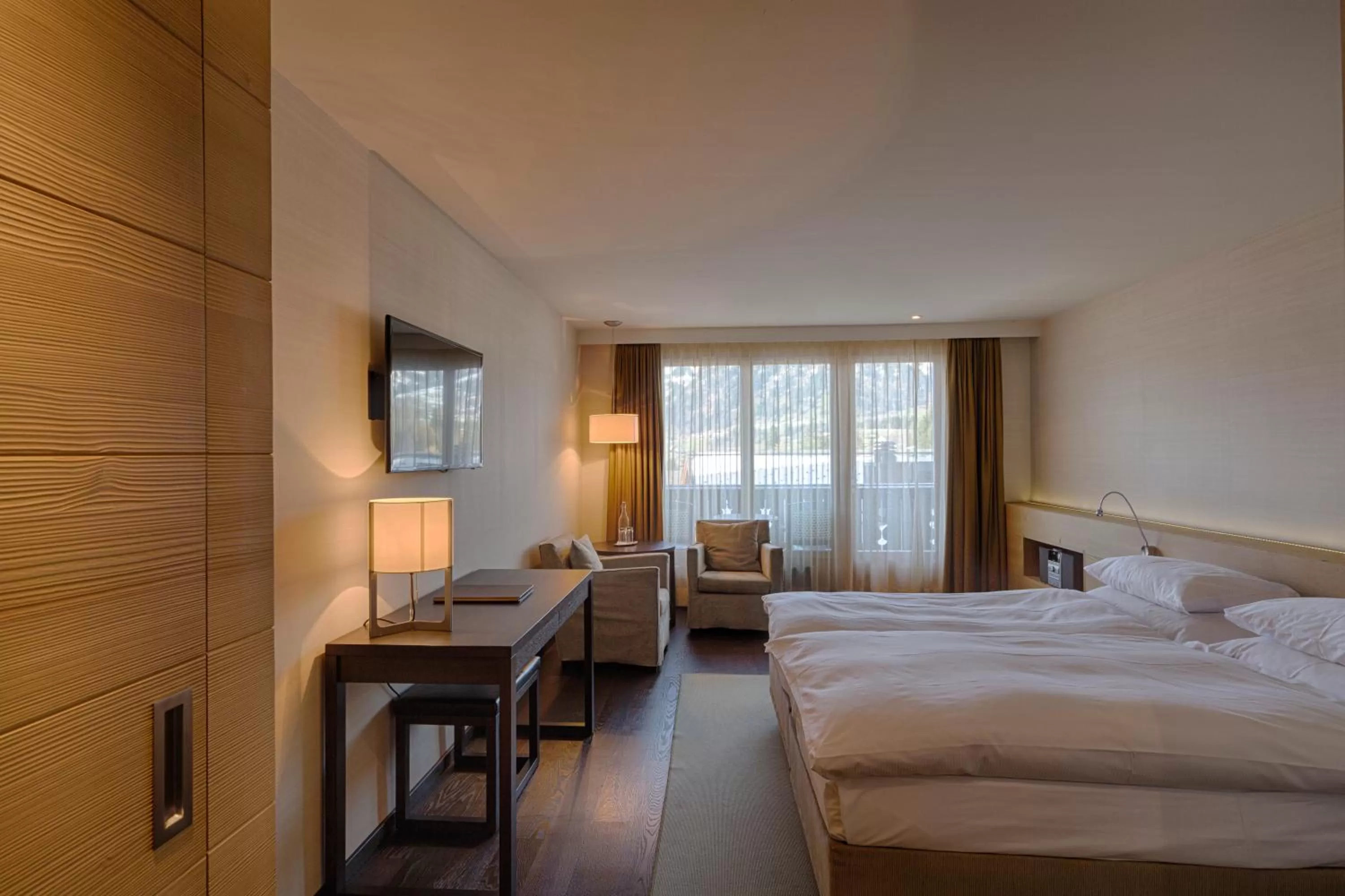 Photo of the whole room, Bed in Bernerhof Swiss Quality Hotel Gstaad