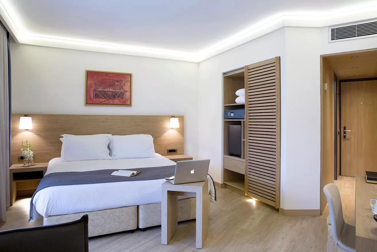 Bed in Golden Age Athens Hotel