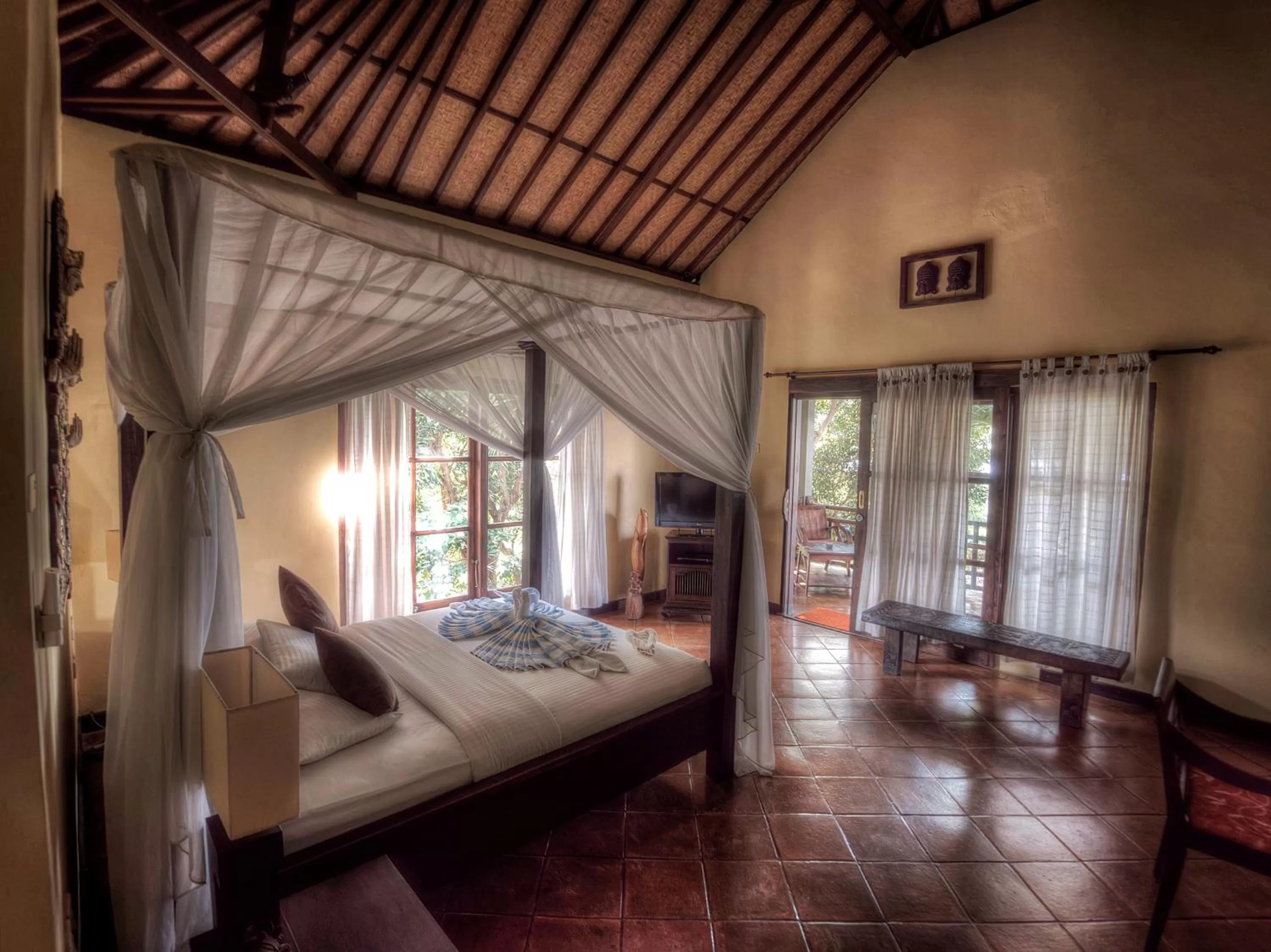 Bed in Puri Mangga Sea View Resort and Spa