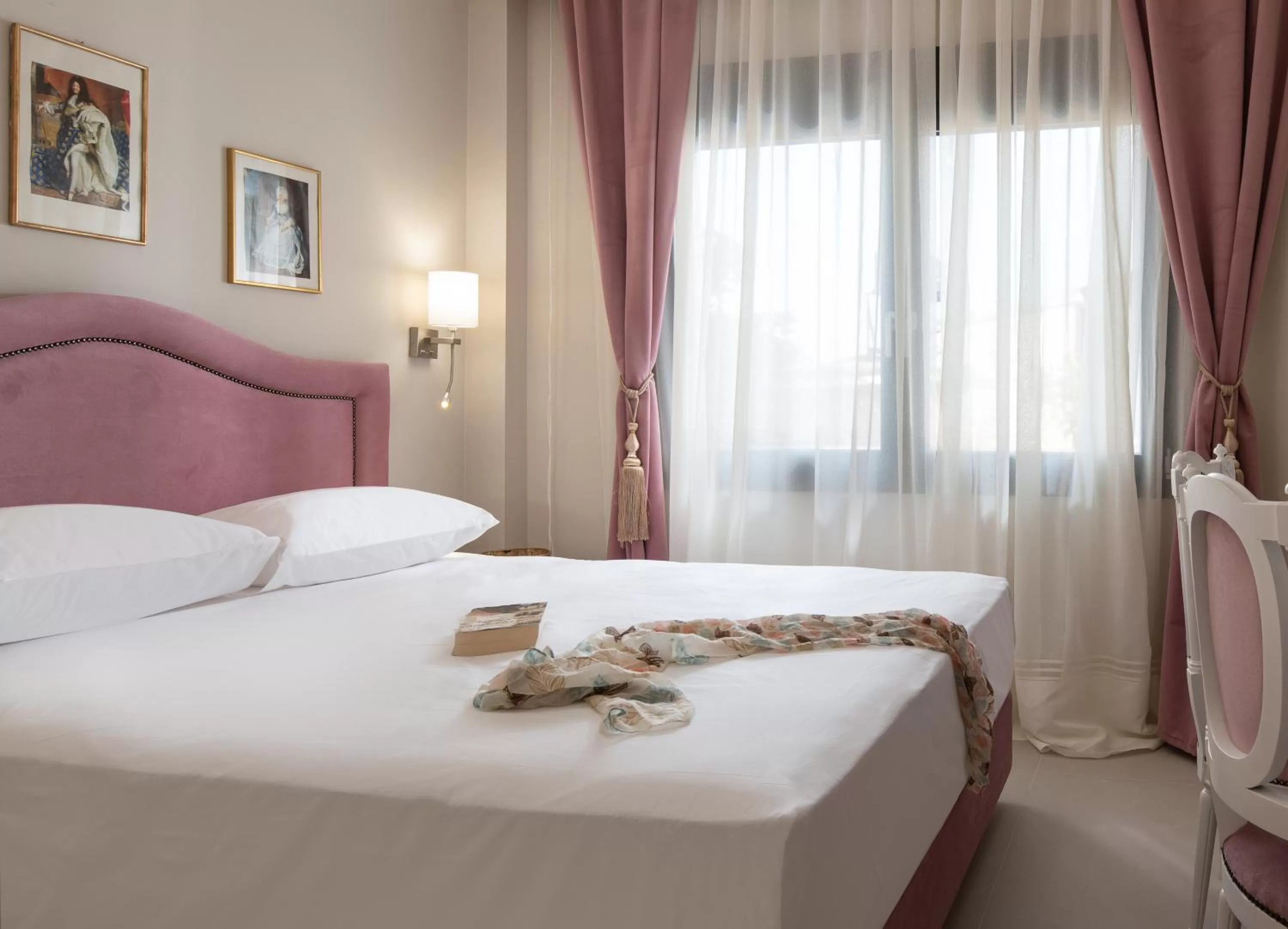 Bed in Light Blue Hotel