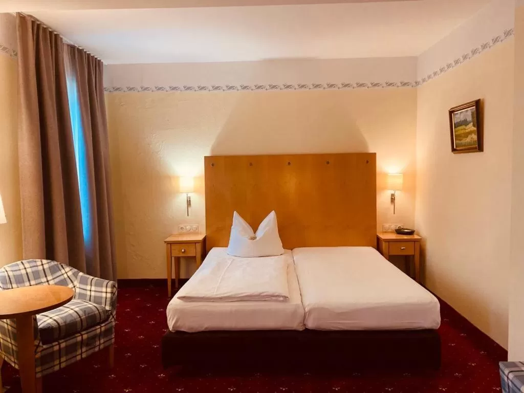 Bed in Hotel Rosenheimer Hof