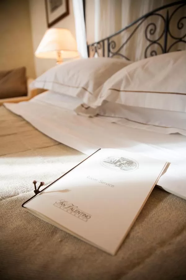 Bed in Cosmo Hotel Torri