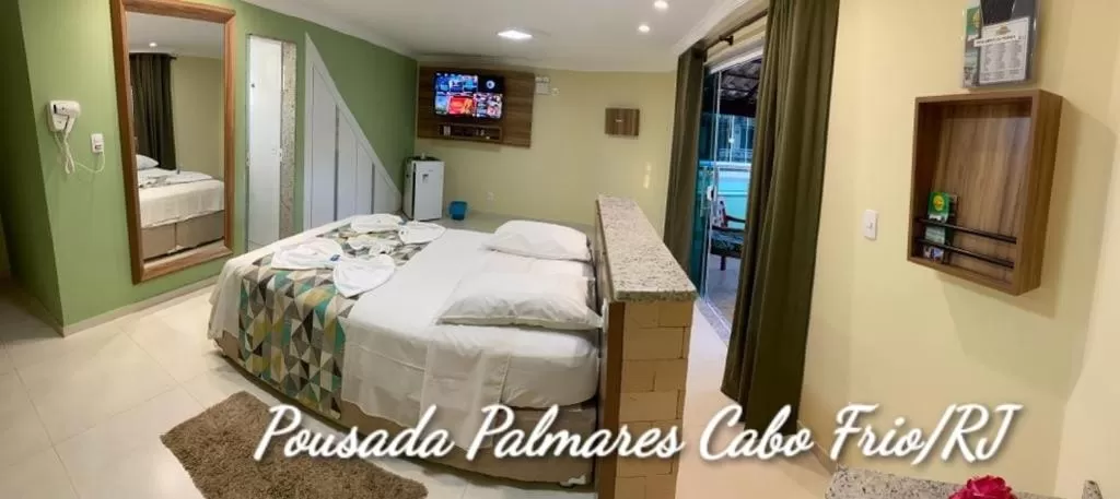 Bed in Pousada Palmares