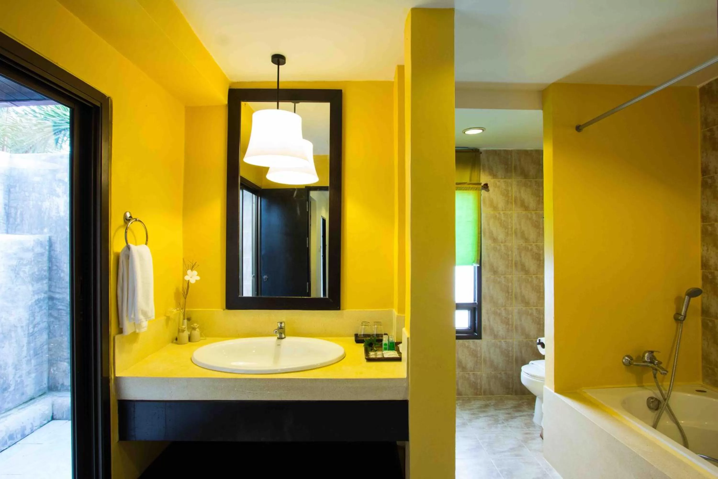 Toilet in Palm Galleria Resort