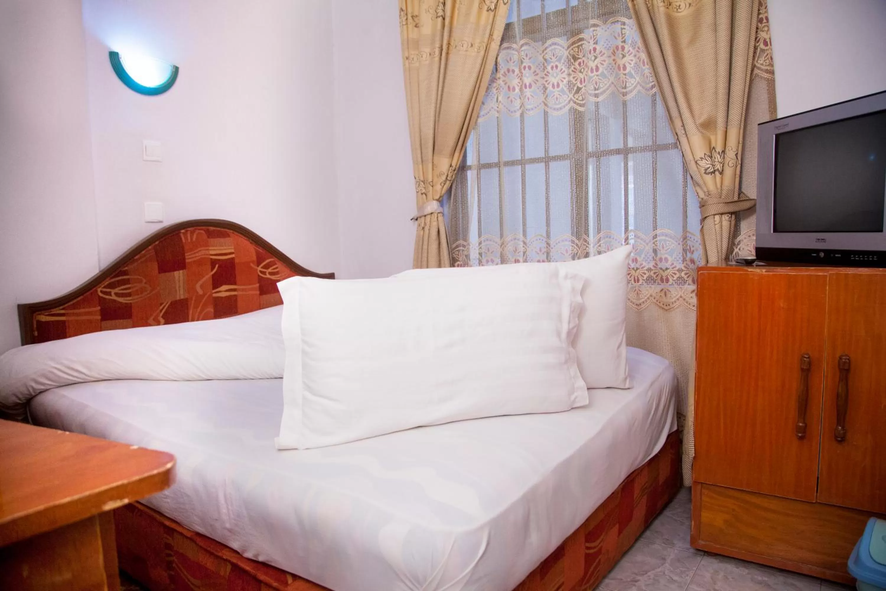 Bed in Natron Palace Hotel