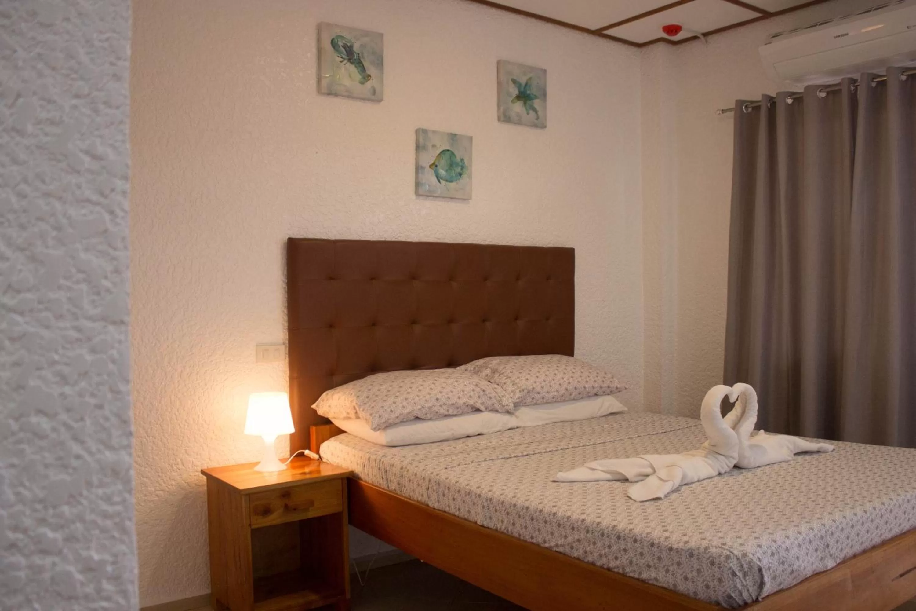 Bed in Jugalis Hotel and Restaurant