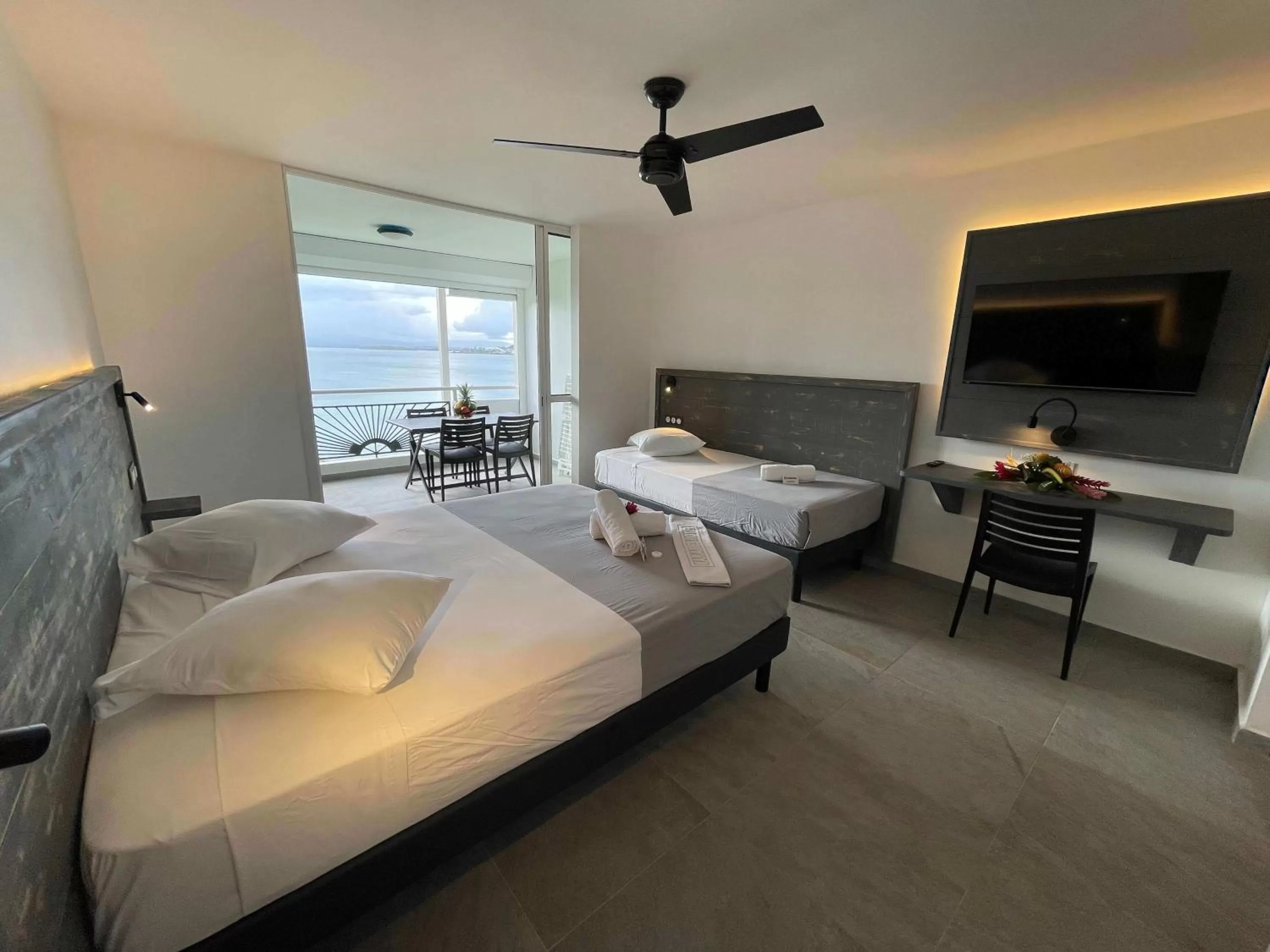 Photo of the whole room, Bed in Karaibes Residence