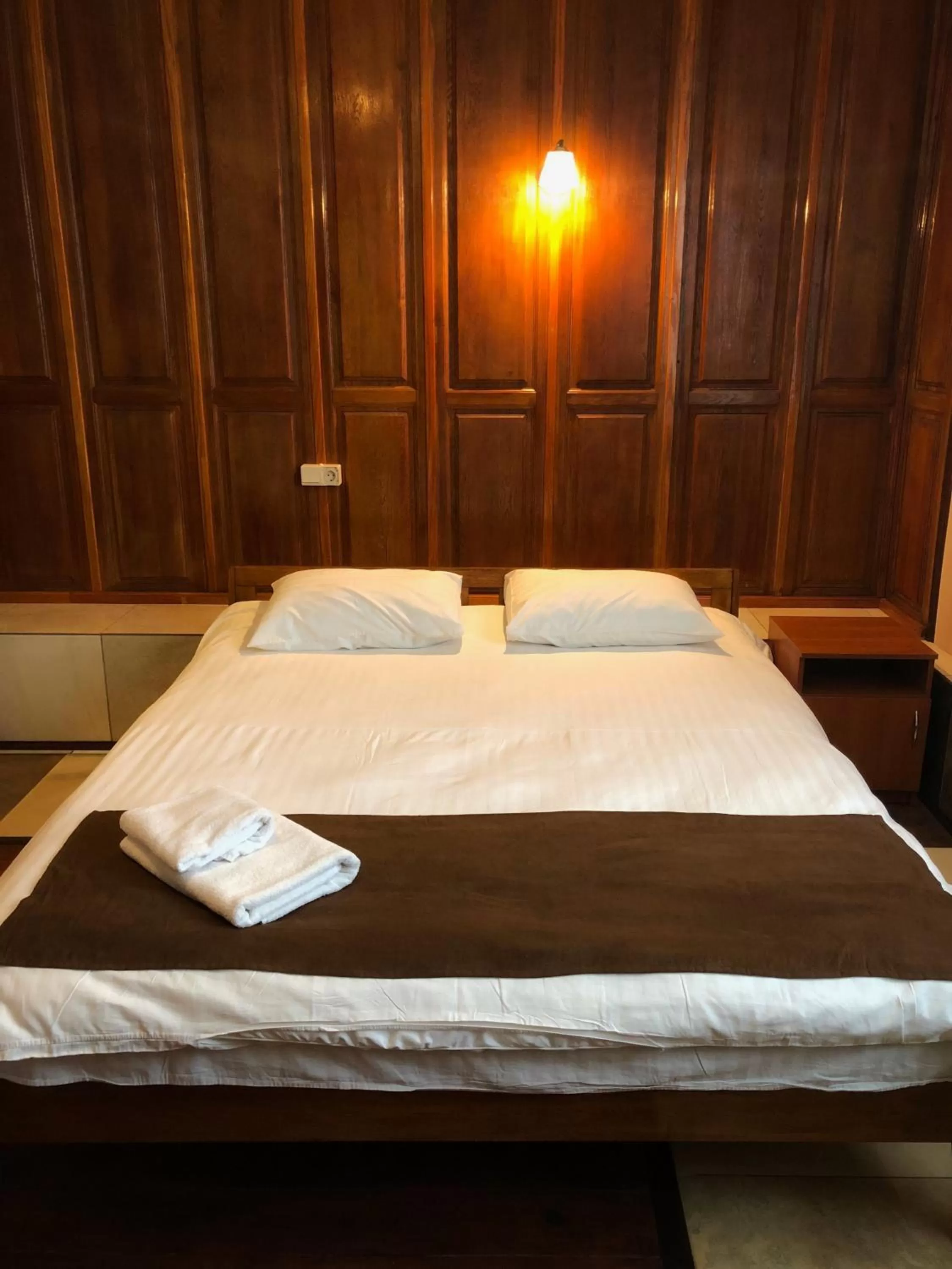 Bed in Zhuliany City Hotel