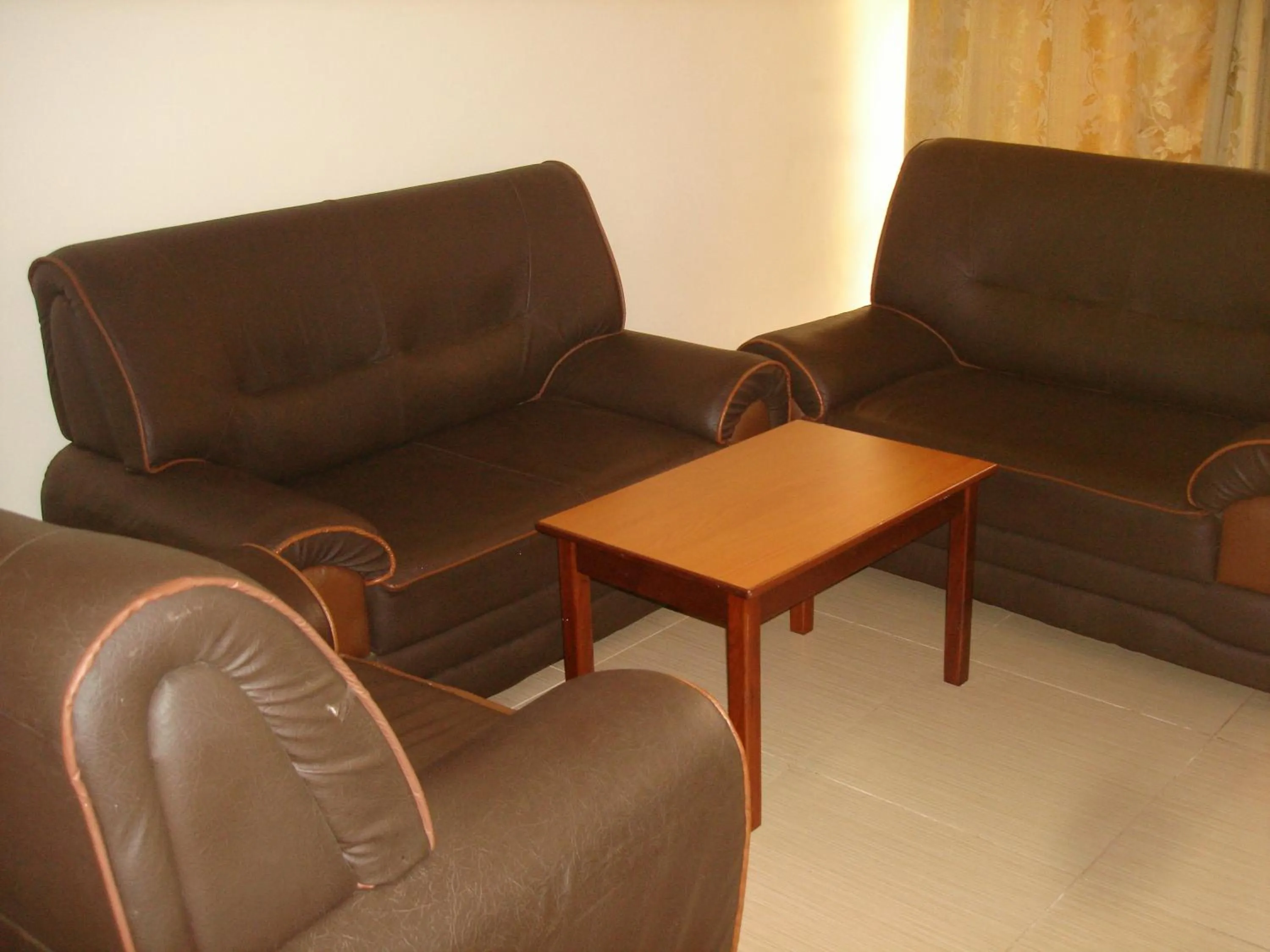 Seating area in Acholi Inn